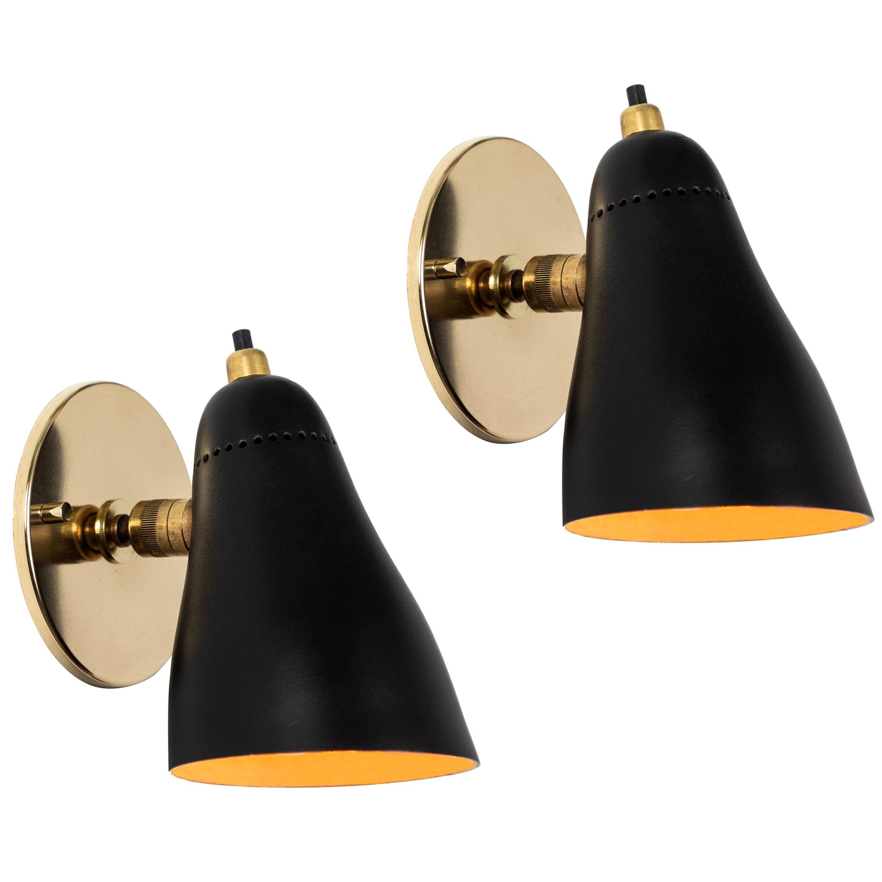 Pair of 1950s Giuseppe Ostuni Black Articulating Sconces for OLuce at 1stDibs