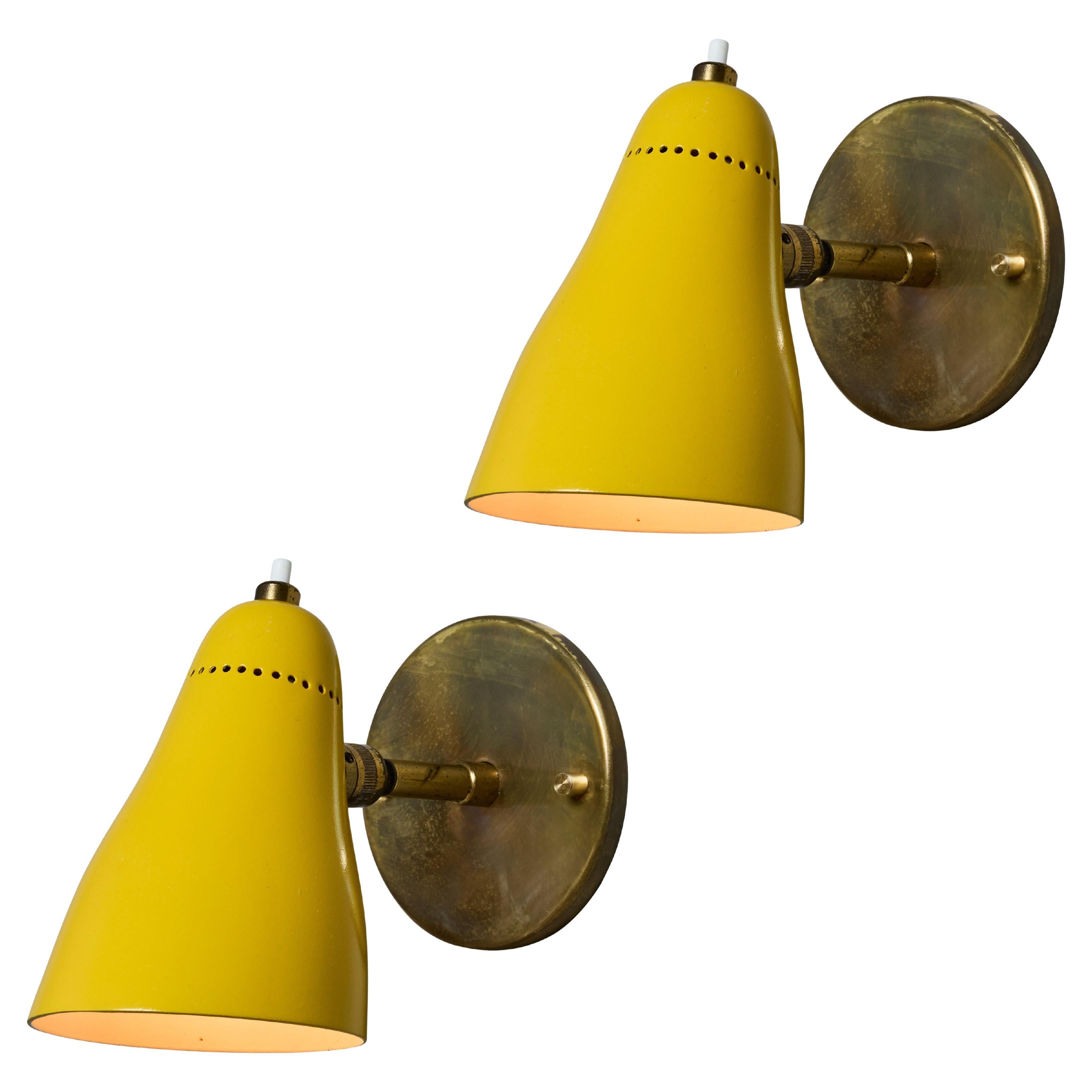 Pair of 1950s Giuseppe Ostuni Model #101 Yellow Articulating Sconces for O-Luce