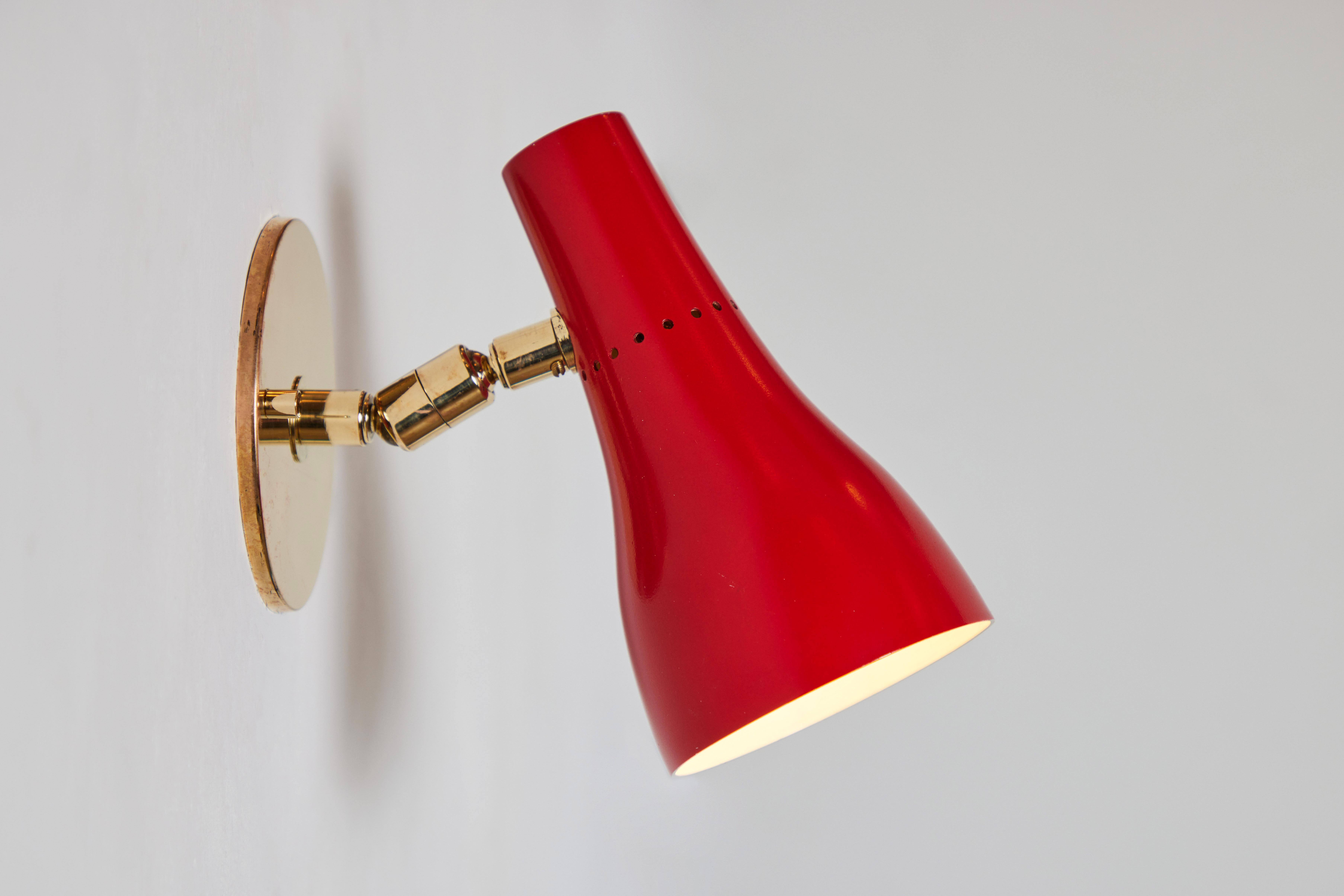 Enameled Pair of 1950s Giuseppe Ostuni Perforated Red Wall Lamps for O-Luce For Sale