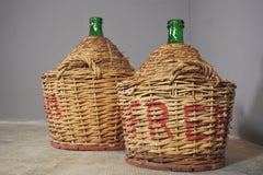 Pair of 1950s Green Glass Demijohns - Vintage Italian Charm