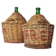 Pair of 1950s Green Glass Demijohns - Vintage Italian Charm