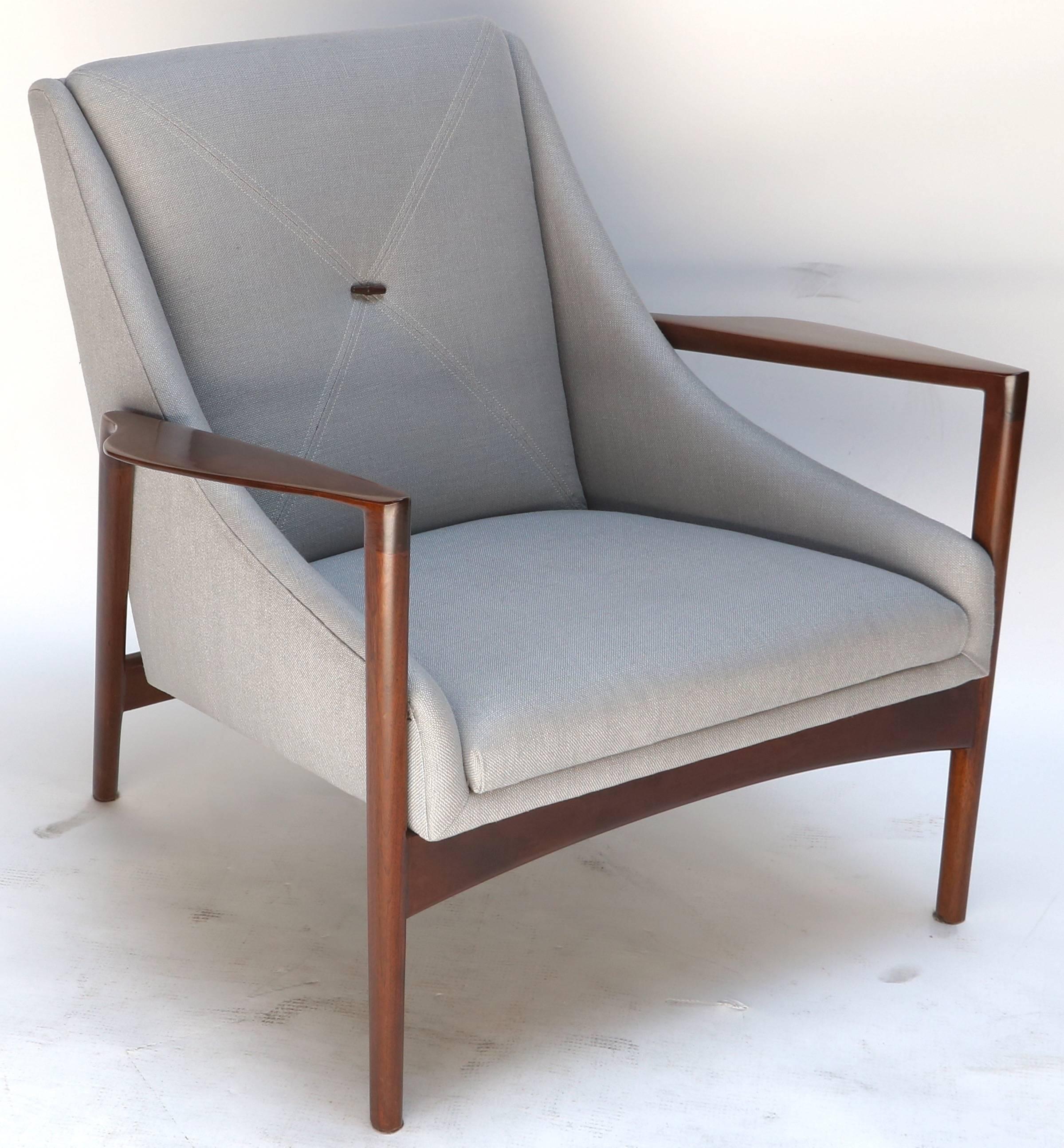 Pair of 1950s lounge chairs or armchairs by Ib Kofod-Larsen upholstered in grey linen with detail stitching.