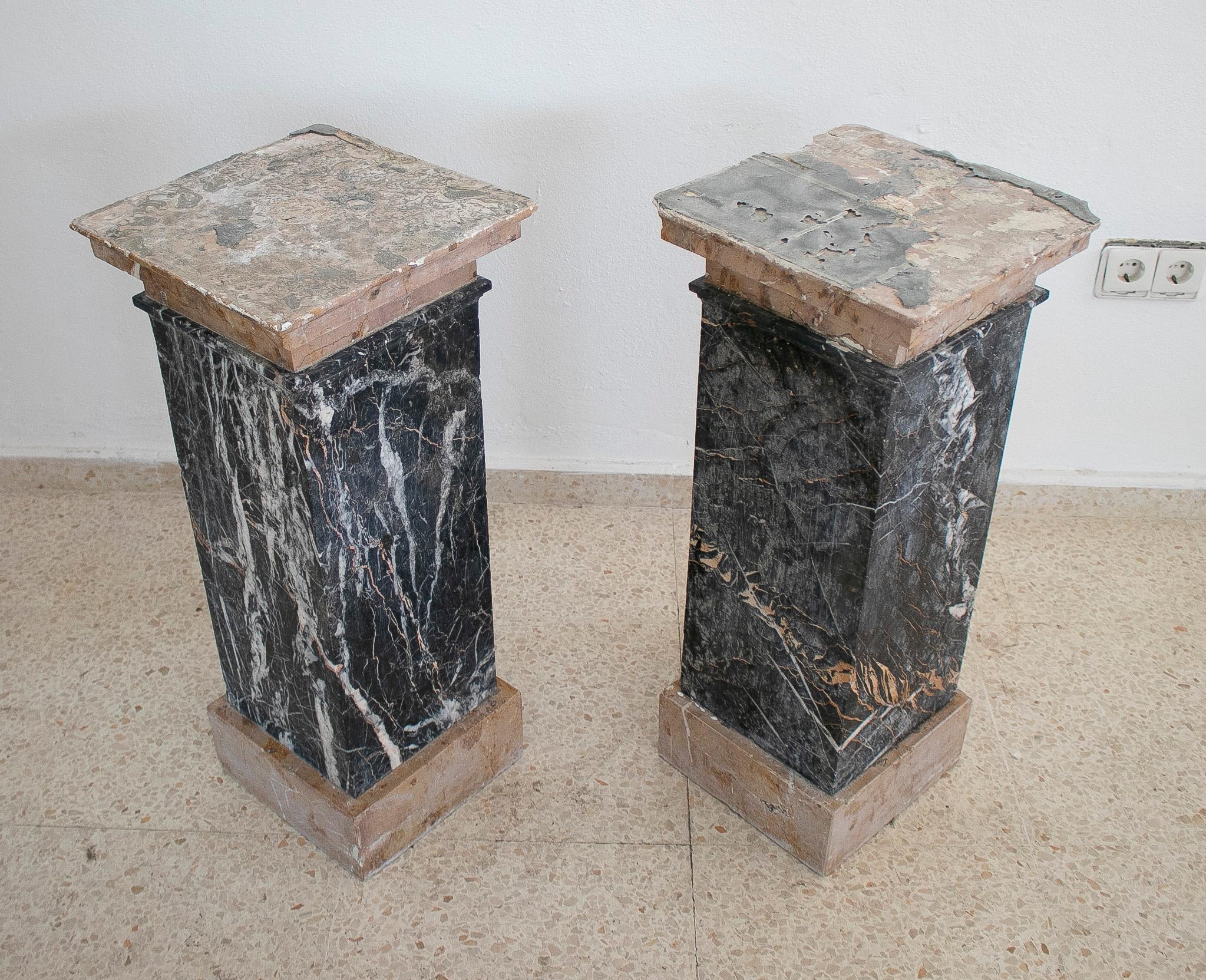 Pair of 1950s Italian classical square pedestal bases with bases and capitals in a Levanto Rosso light red marble and the shaft in a strongly white veined black marble.