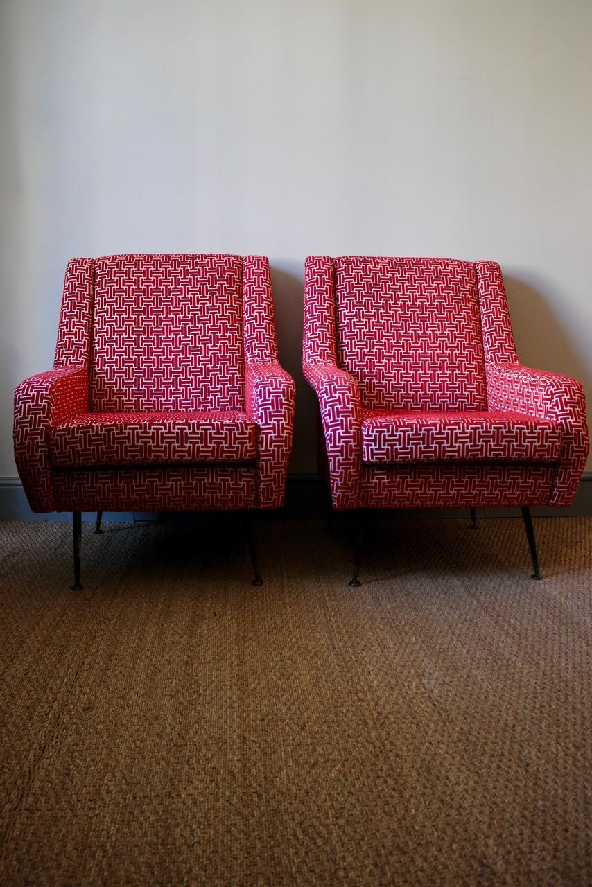 A very stylish pair of circa 1950s Italian armchairs, having been reupholstered in a red and white fabric.
Floor to seat 45cm height Italy. 
 