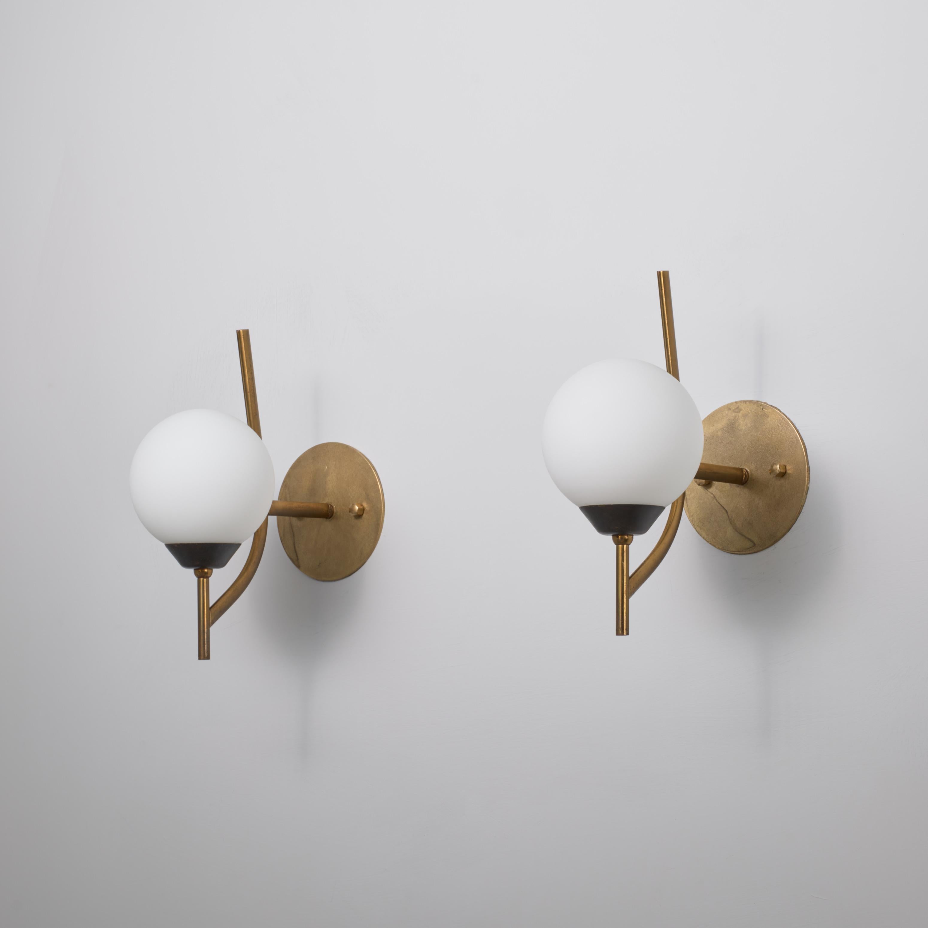 Mid-Century Modern Pair of 1950s Italian Brass and Burnished Steel Sconces with Opaline Glass Globe For Sale