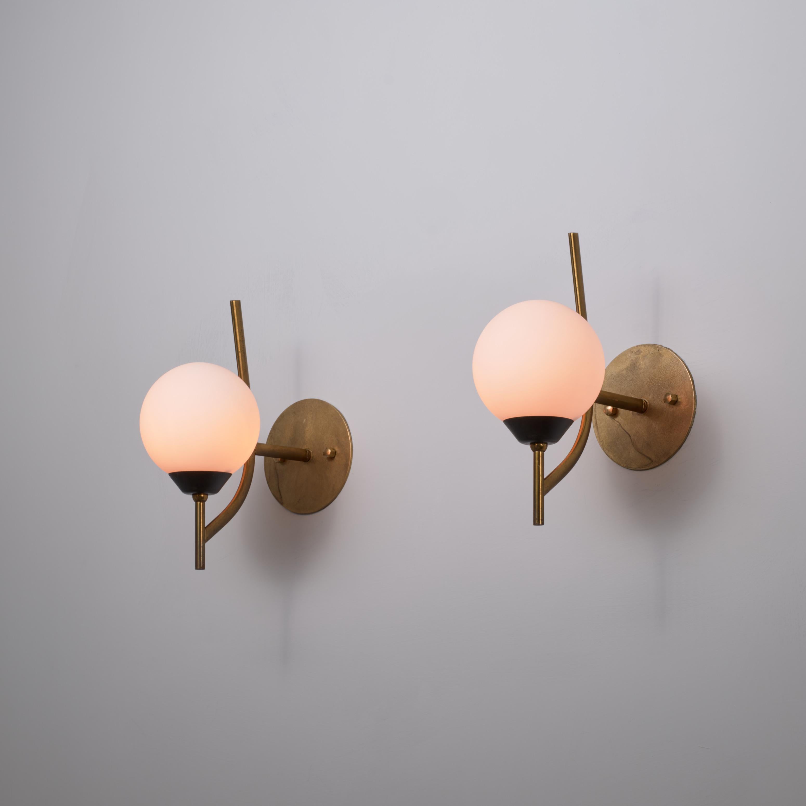 Mid-20th Century Pair of 1950s Italian Brass and Burnished Steel Sconces with Opaline Glass Globe For Sale