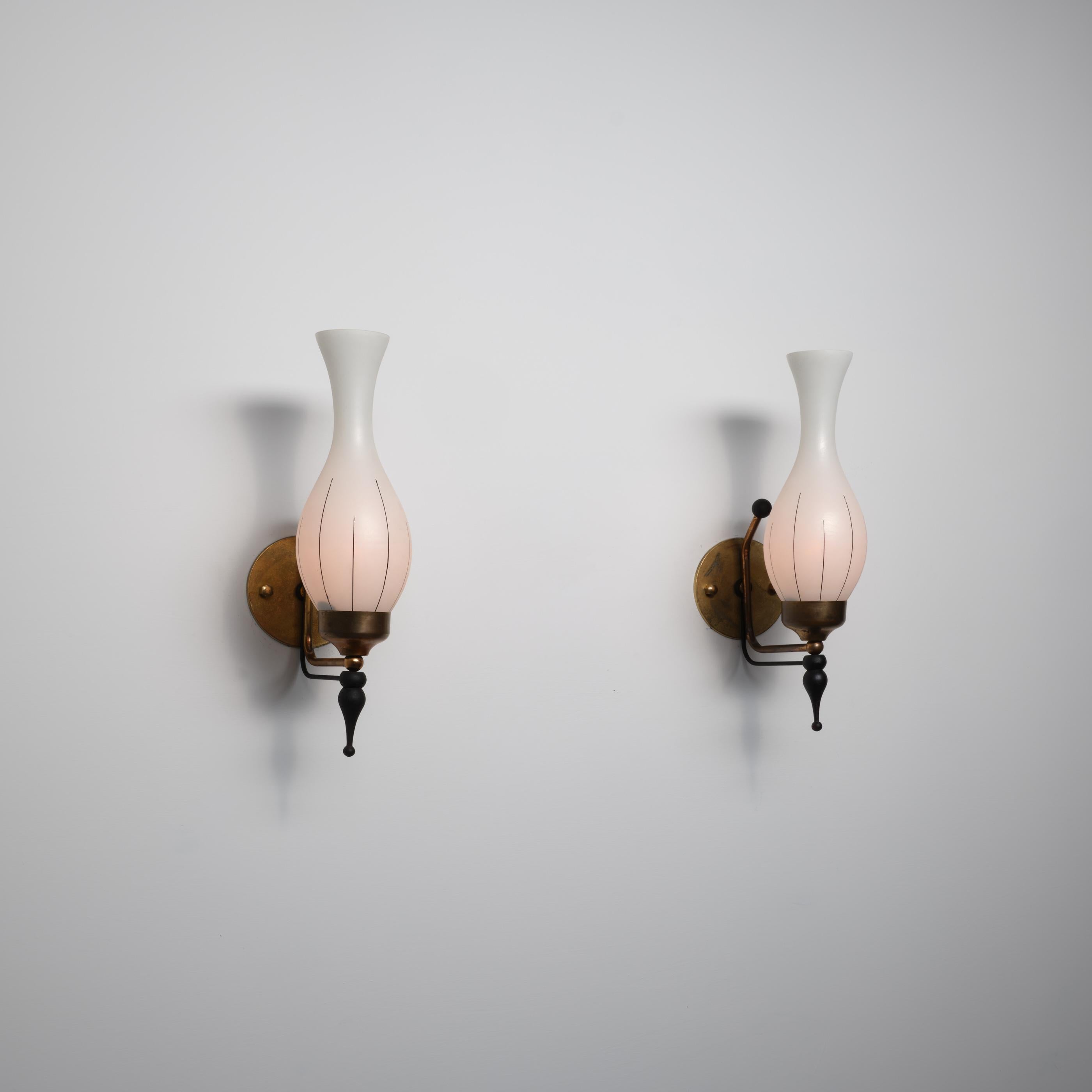 Italiano Pair of 1950s Italian Brass, Black-Lacquered Metal & Opaline Glass Wall Sconces in vendita