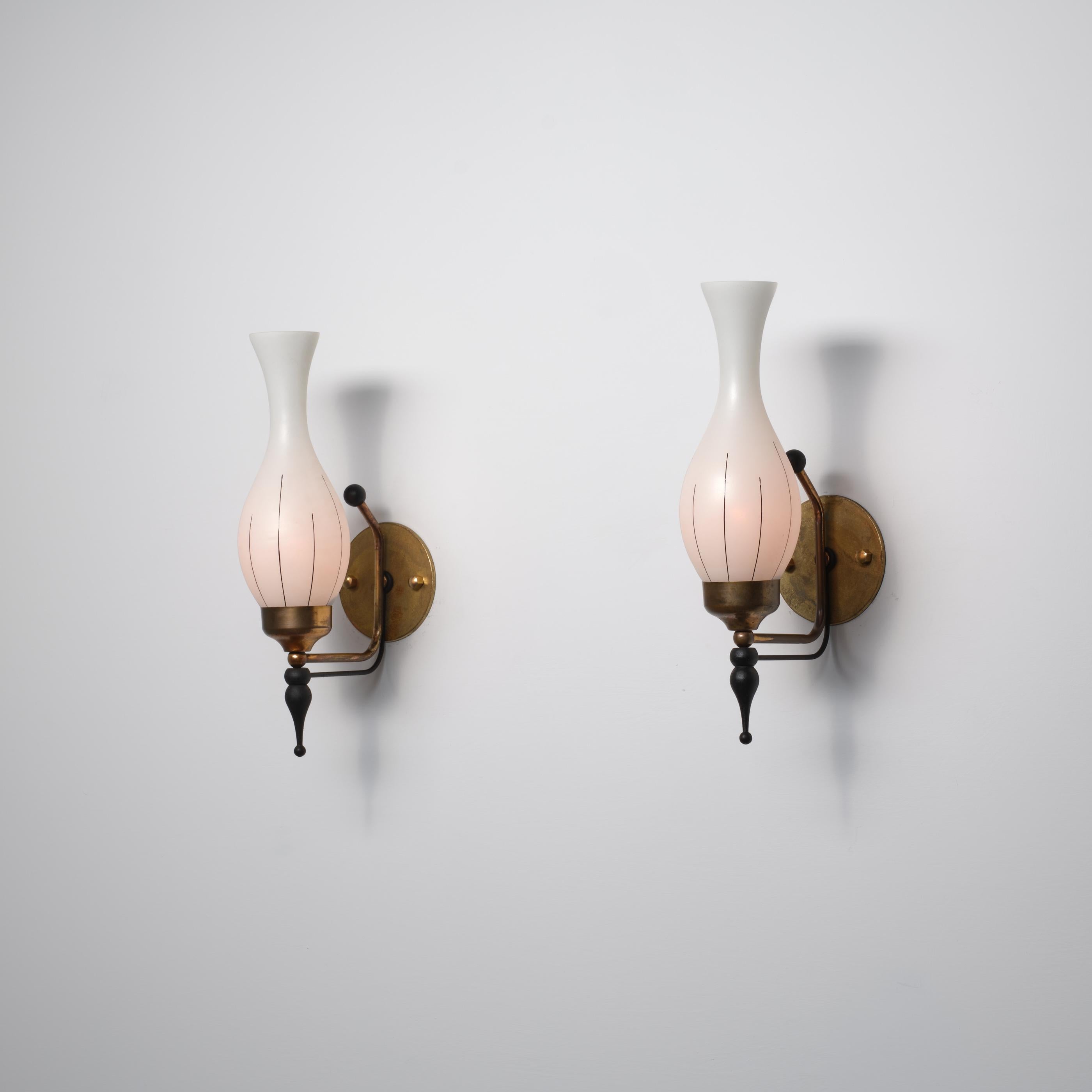 Metà XX secolo Pair of 1950s Italian Brass, Black-Lacquered Metal & Opaline Glass Wall Sconces in vendita