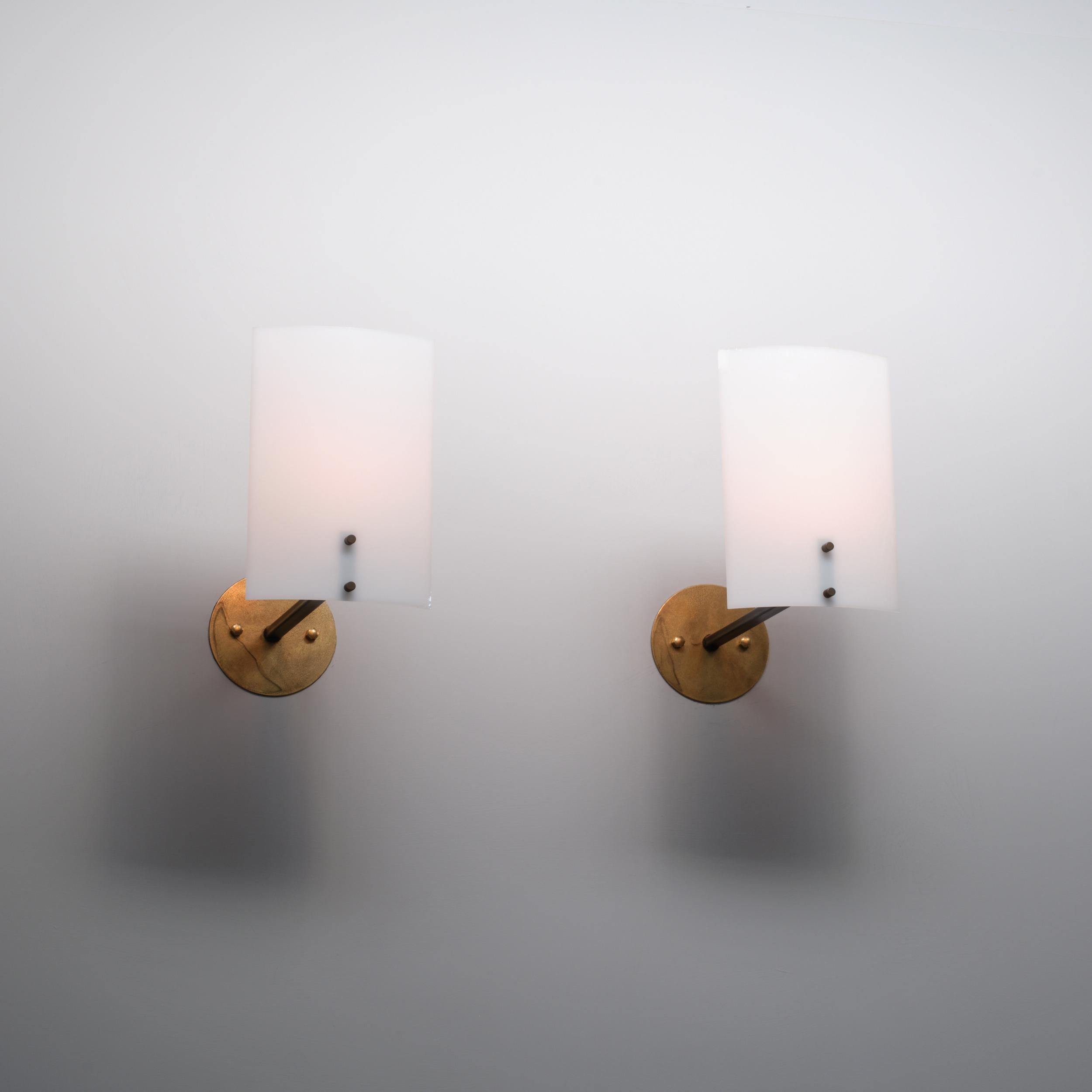 Mid-20th Century Pair of 1950s Italian Brass  Sconces with Curved White Diffusers For Sale