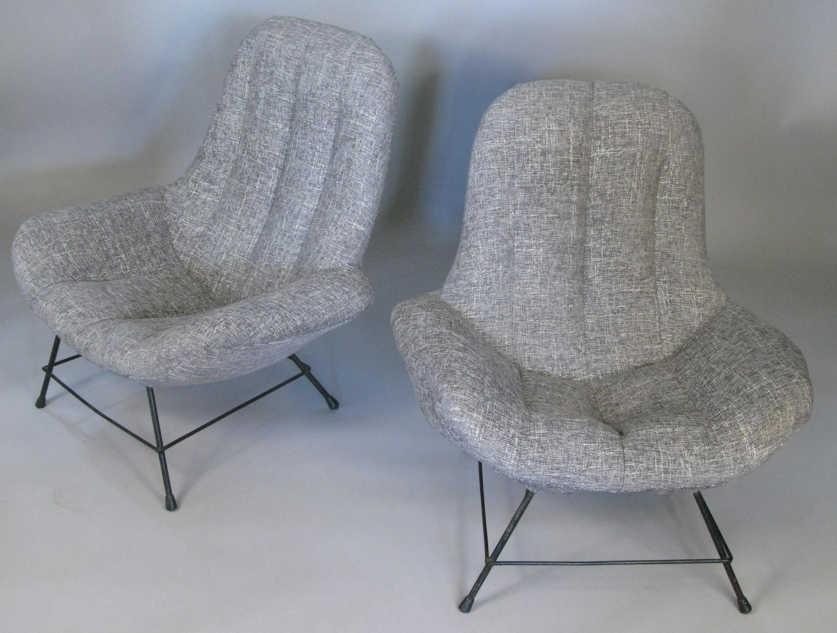 A pair of very comfortable vintage 1950s Italian lounge chairs, originally purchased at R Gallery in NYC. these are reminiscent of designs by Augusto Bozzi for Saporiti Italia. They have wrought iron frames, and have just been reupholstered in a