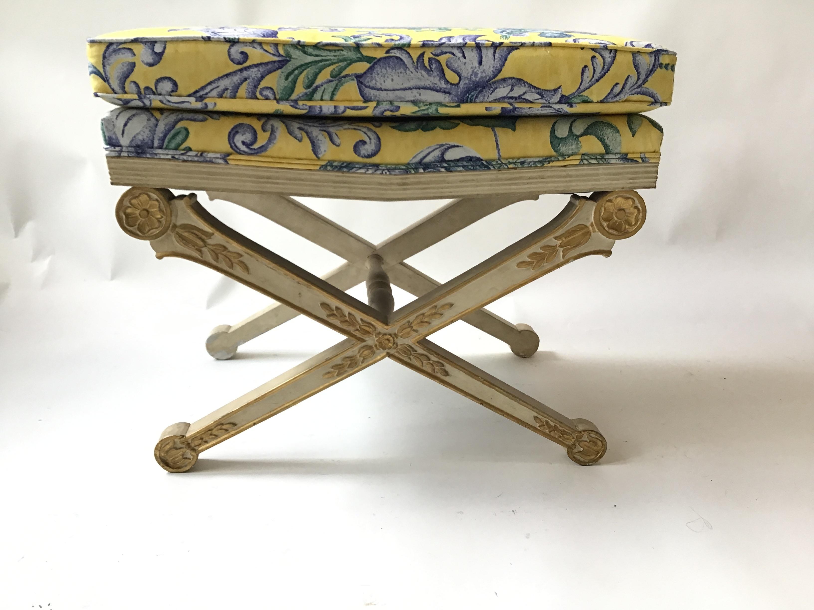 Pair of 1950s Italian, Regency style painted wood benches. Gilt accents, hand carved. Scalamandre fabric.