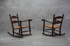 Pair of 1950s italian rocking armchairs with rush seats