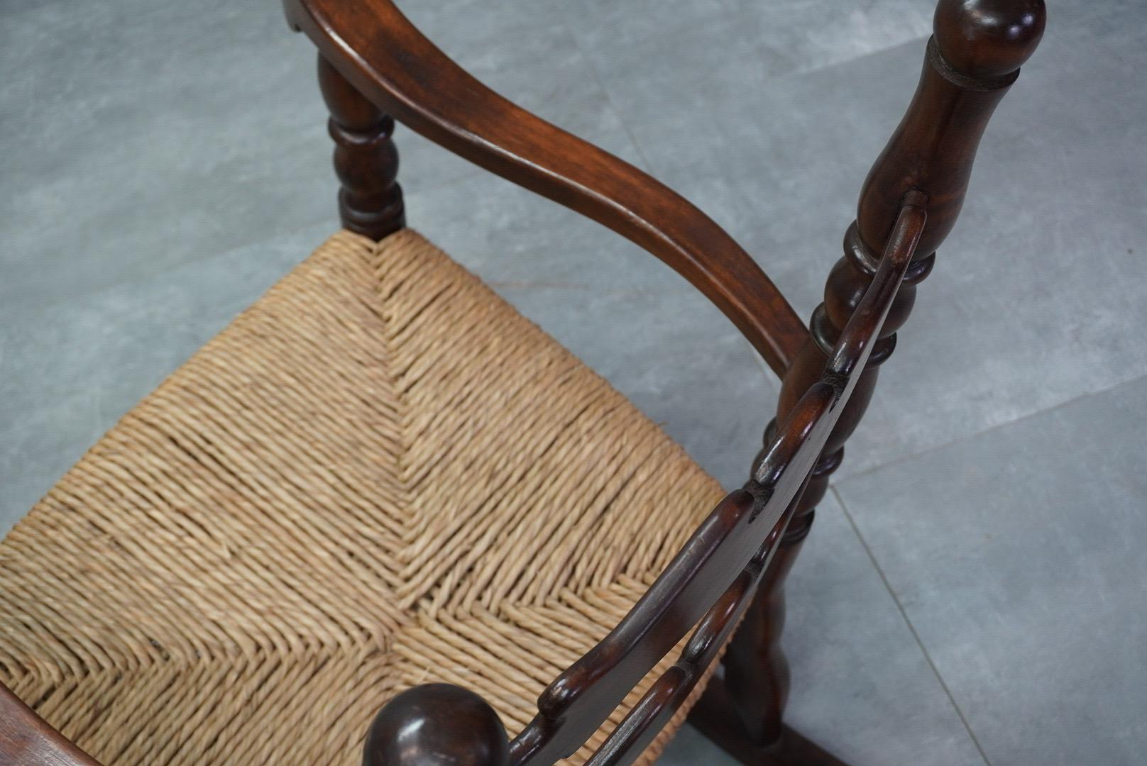 Pair of 1950s italian rocking armchairs with rush seats For Sale 1