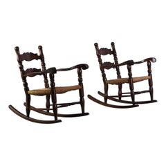 Pair of 1950s italian rocking armchairs with rush seats