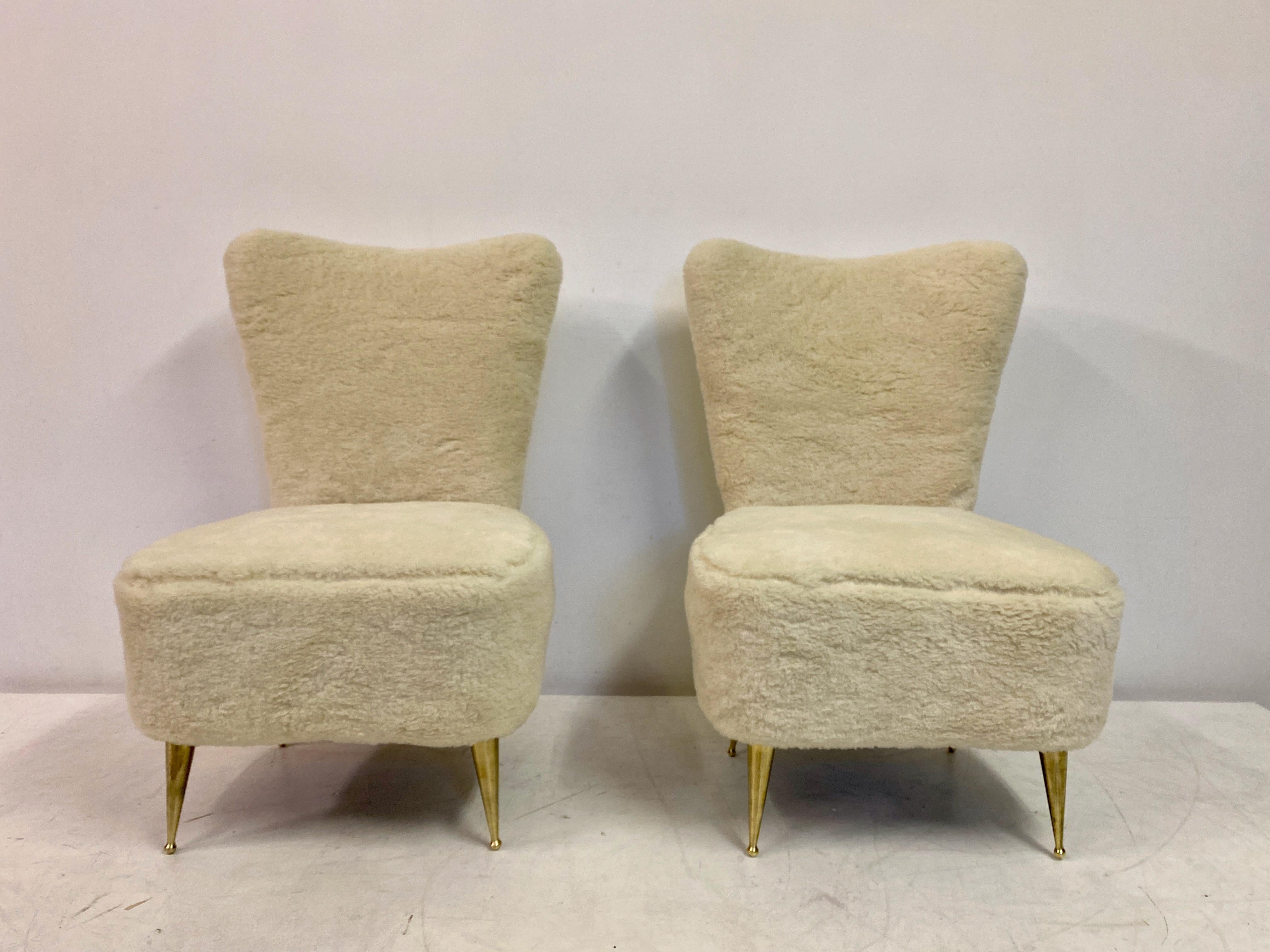 Pair of slipper chairs

New Designers Guild faux fur upholstery

Brass legs

Seat height 40cm

Italy 1950s