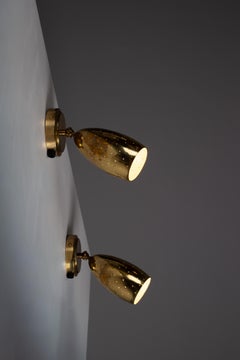 Pair of 1950s Itsu model EY 67, perforated brass wall sconces, Finland