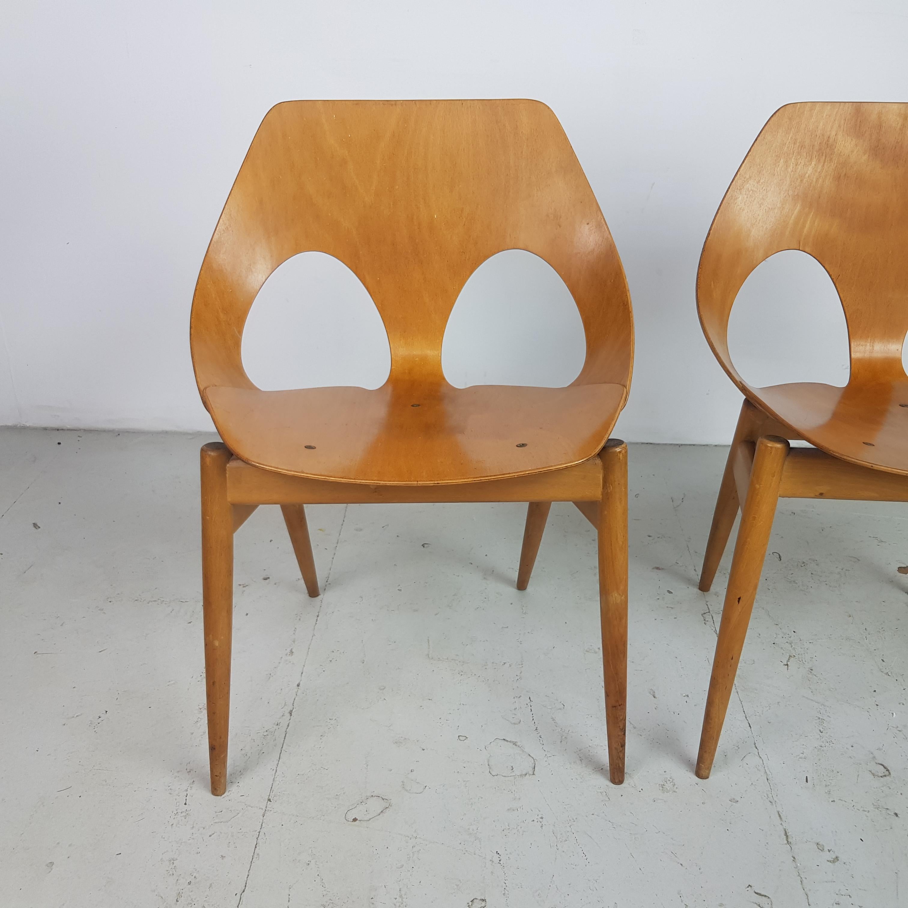 A pair of 1950s Jason chairs designed by Carl Jacobs & Frank Guille for Kandya.

The Jason chair was designed by the Danish designer Carl Jacobs but was manufactured by Kandya, a British firm. This lightweight, stackable, chair has gently tapering