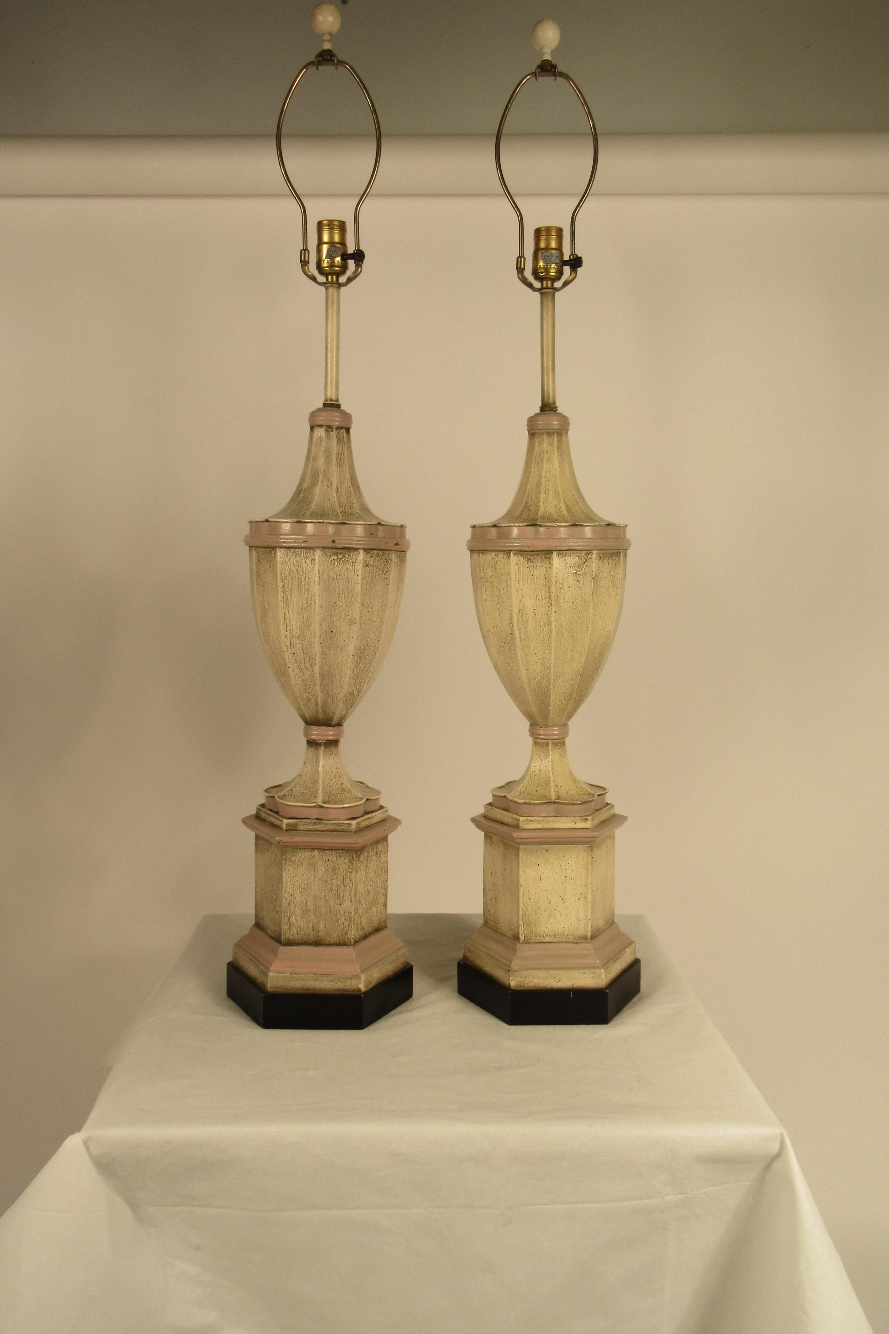 Pair of 1950s plaster finial lamps. White and pink. Need to be wired. Some of 
the pictures came out yellow, the true color are the whiter pictures.