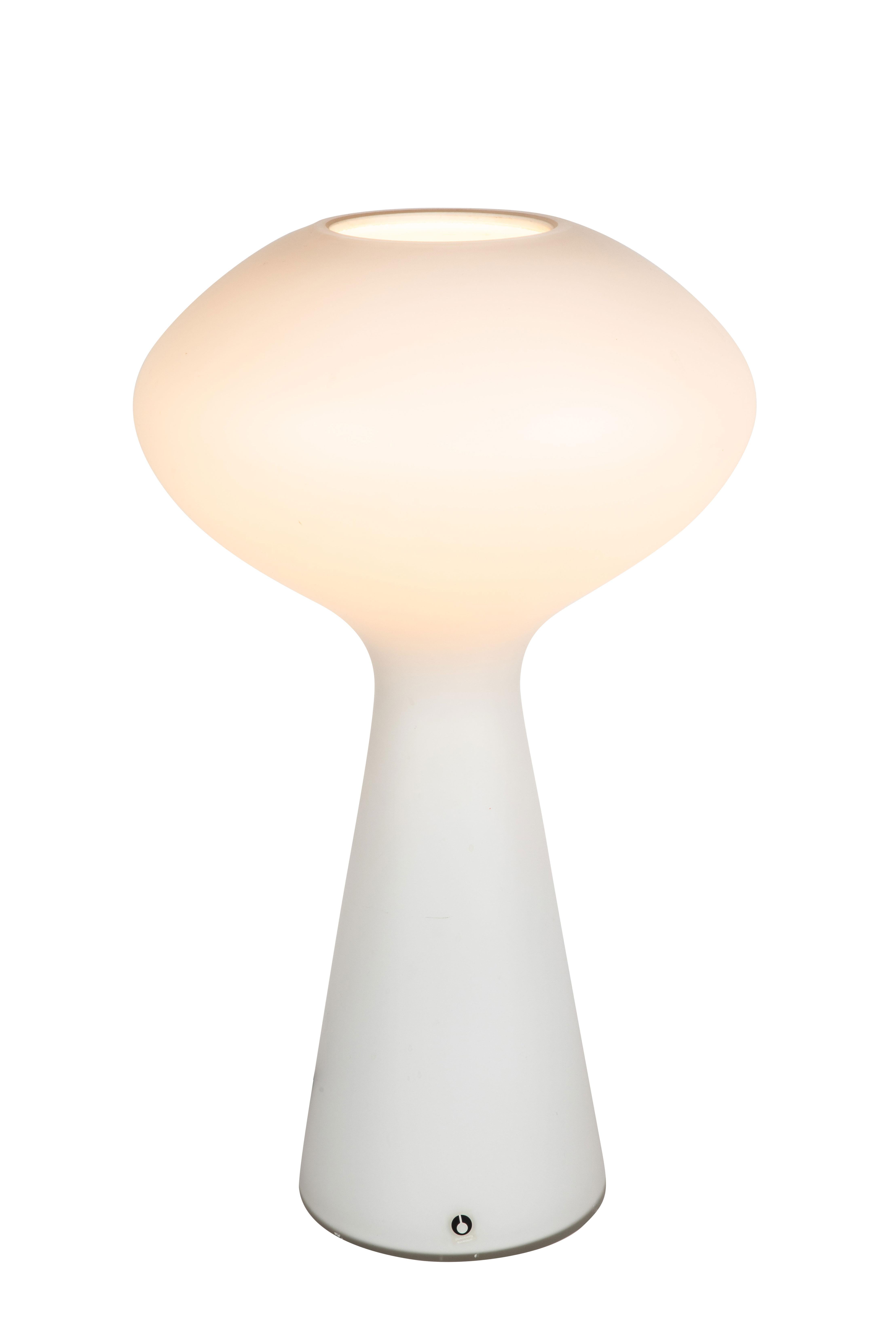 Pair of 1950s Lisa Johansson-Pape table lamps for Iittala. Comprised of a sculptural single piece of mold-blown, sandblasted and acid-etched opaline glass made in Finland, circa 1954. Retain original manufacturer's label. A contemporary of Paavo