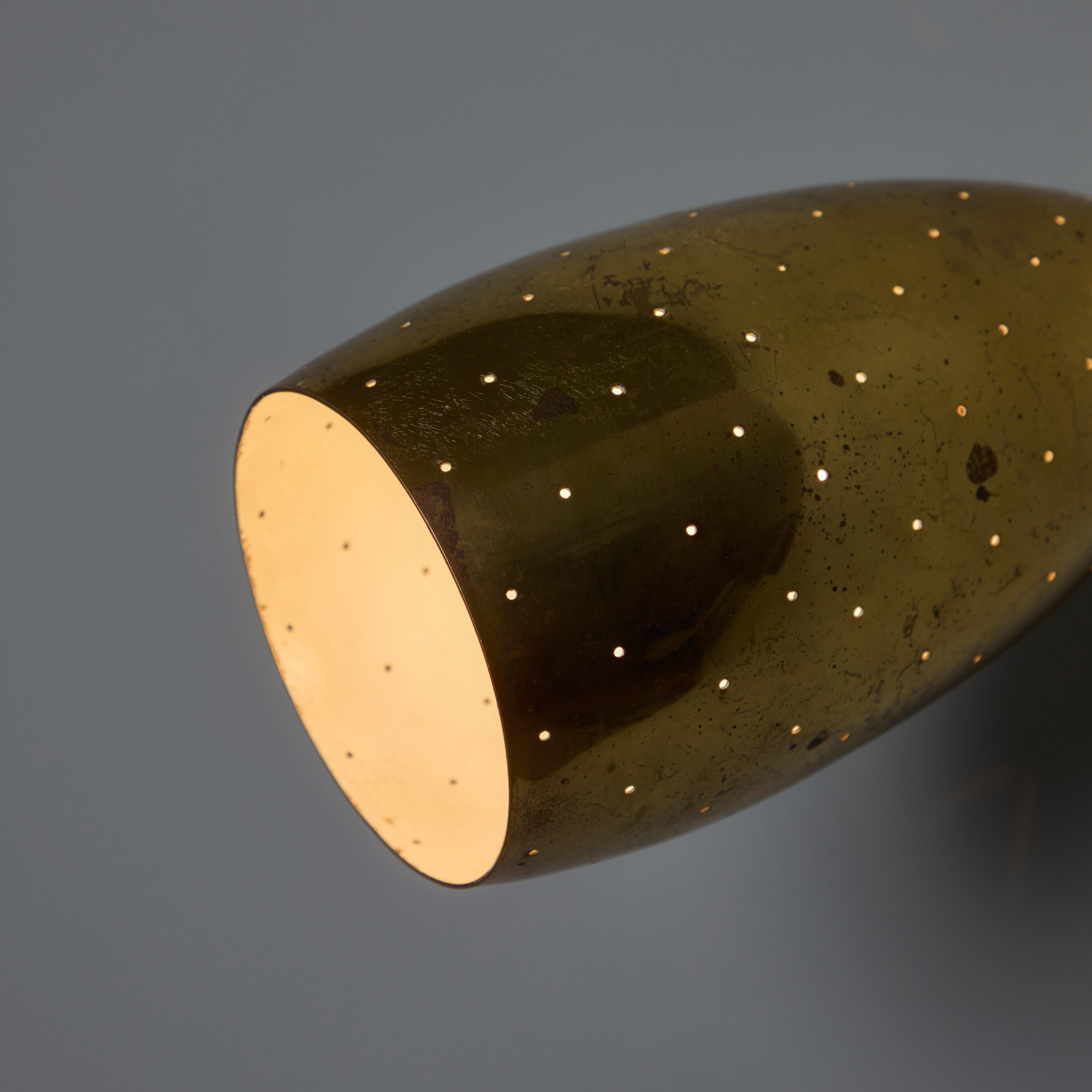 Patinated Pair of 1950s Mauri Almari Perforated Brass Sconces for Itsu For Sale