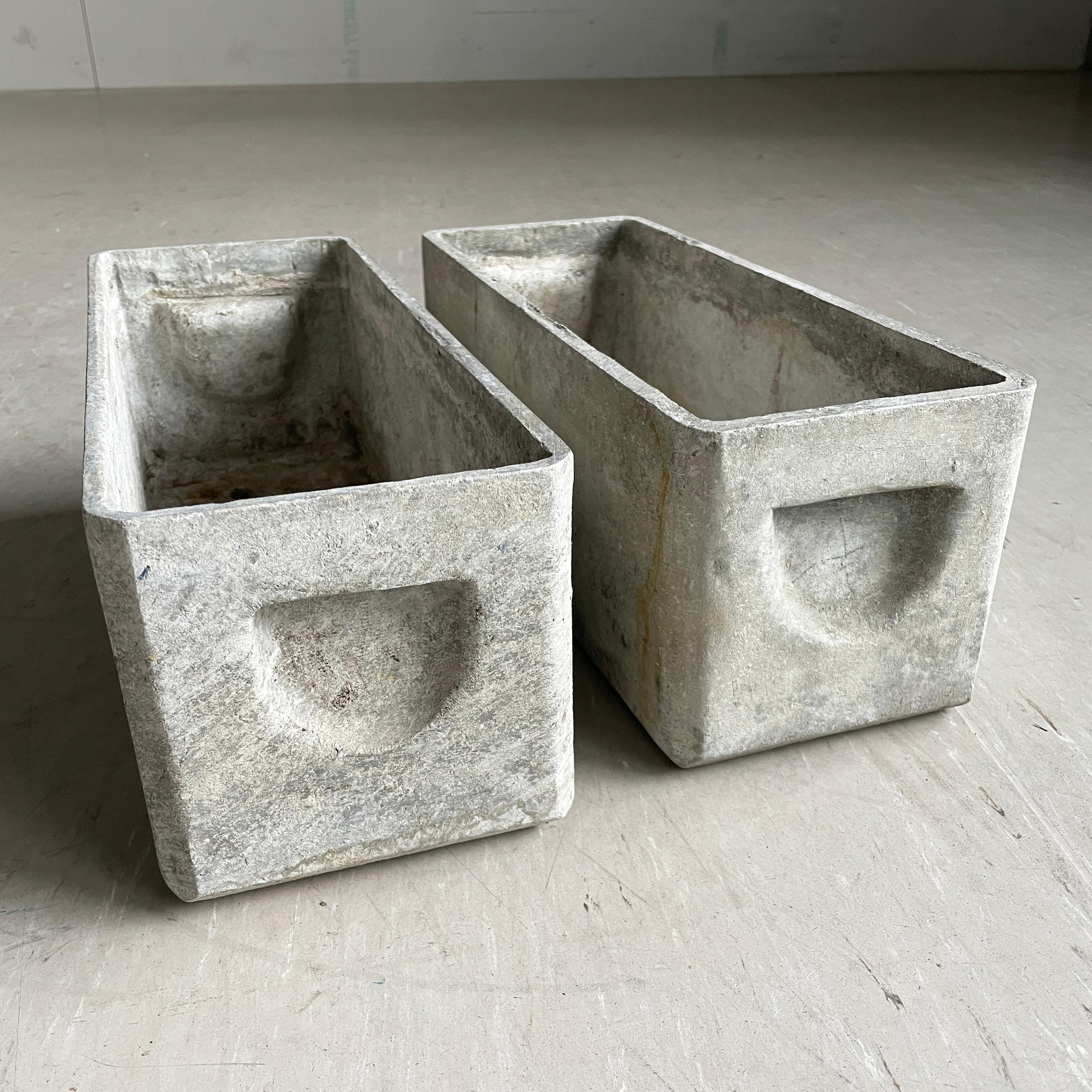 Pair of minimalist concrete plant trough's by prominent Swiss designer, Willy Guhl. Made in Switzerland ca. 1950 - 1960. Produced by Eternit AG, Switzerland. Solid concrete with drainage holes. With original recessed handles.
In original condition
