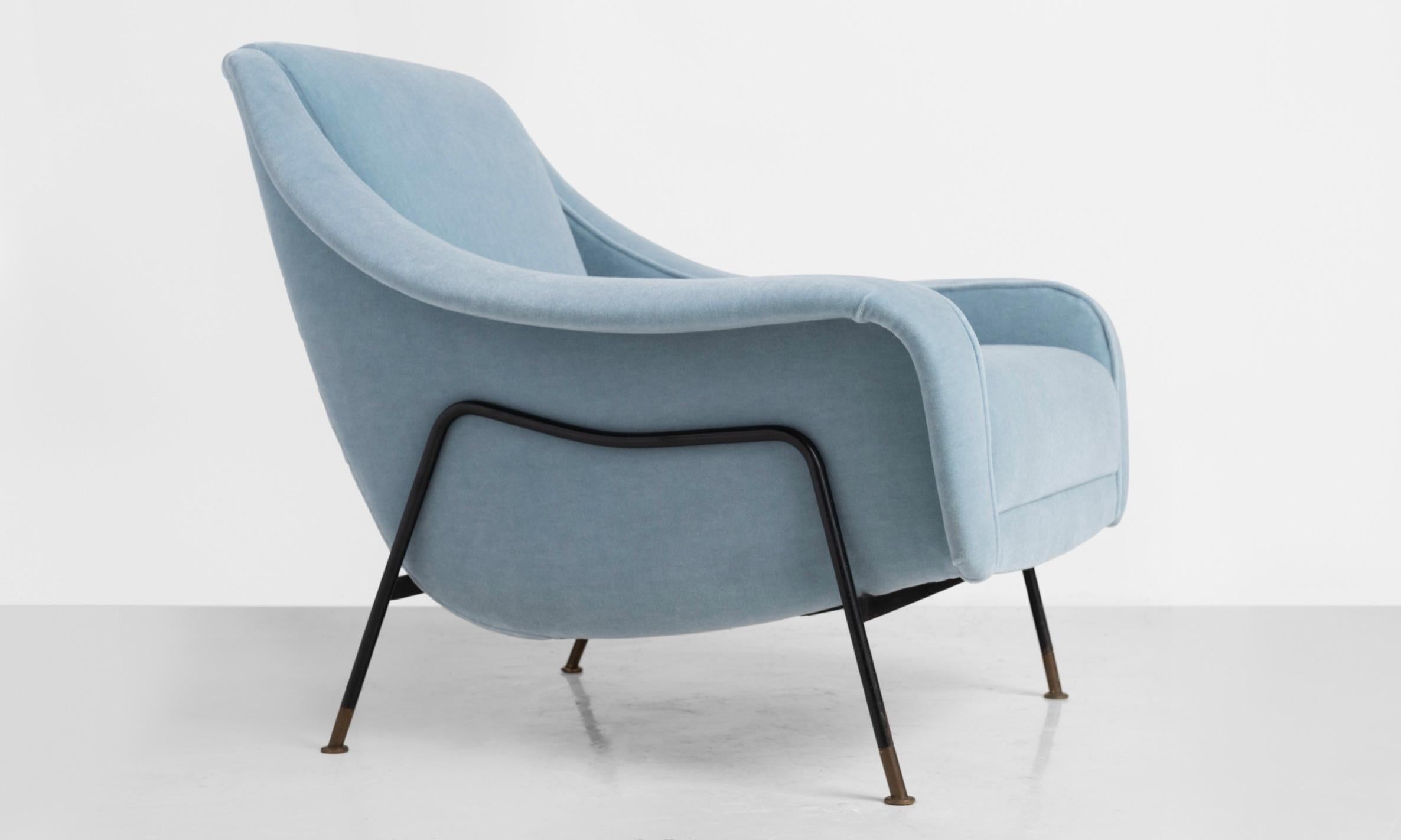 Pair of Ezio Minotti lounge chairs, Italy, 1950. Newly upholstered in blue Maharam Mohair supreme. Legs are black painted metal with brass feet. One pair (2 total) available.

 