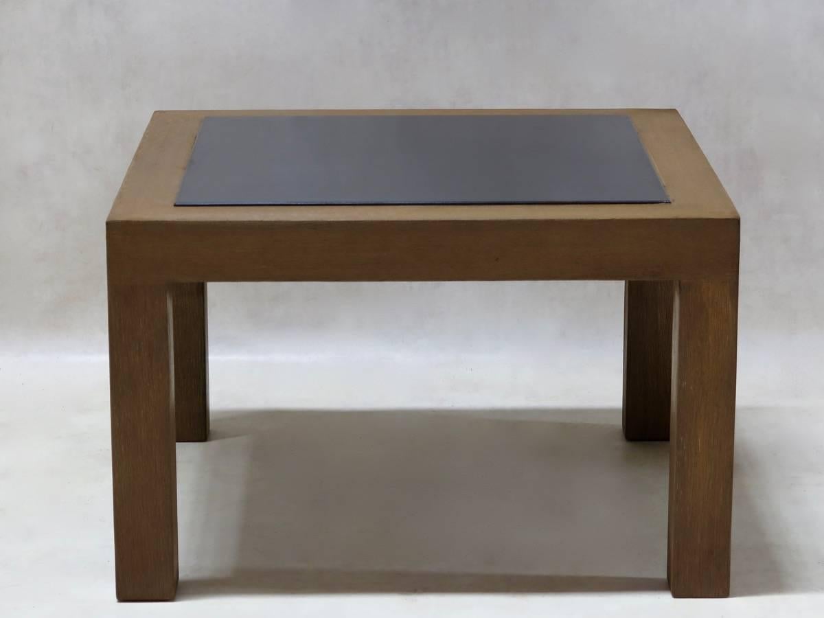 Chic and Minimalist pair of square coffee tables, with a polished oak structure and black slate tops.