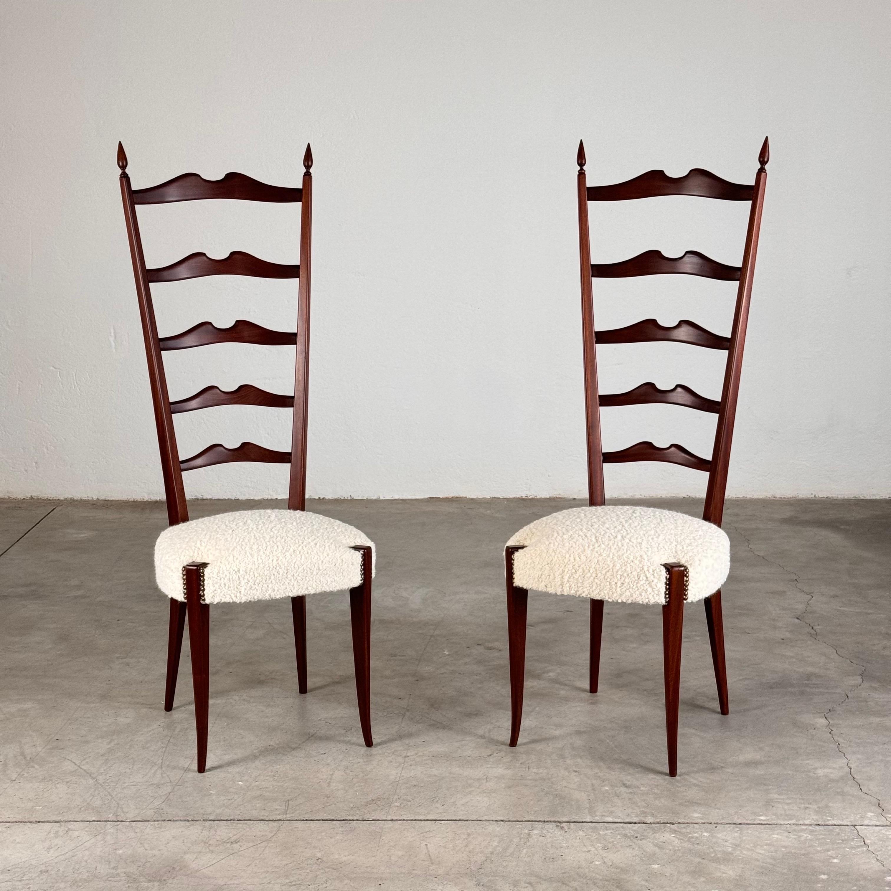 A beautiful pair of high-back Chiavari chairs designed by renowned Italian architect Paolo Buffa in the 1950s. These chairs, made from finely ebonized wood, showcase Buffa's signature elegance and attention to detail. Recently restored by our expert