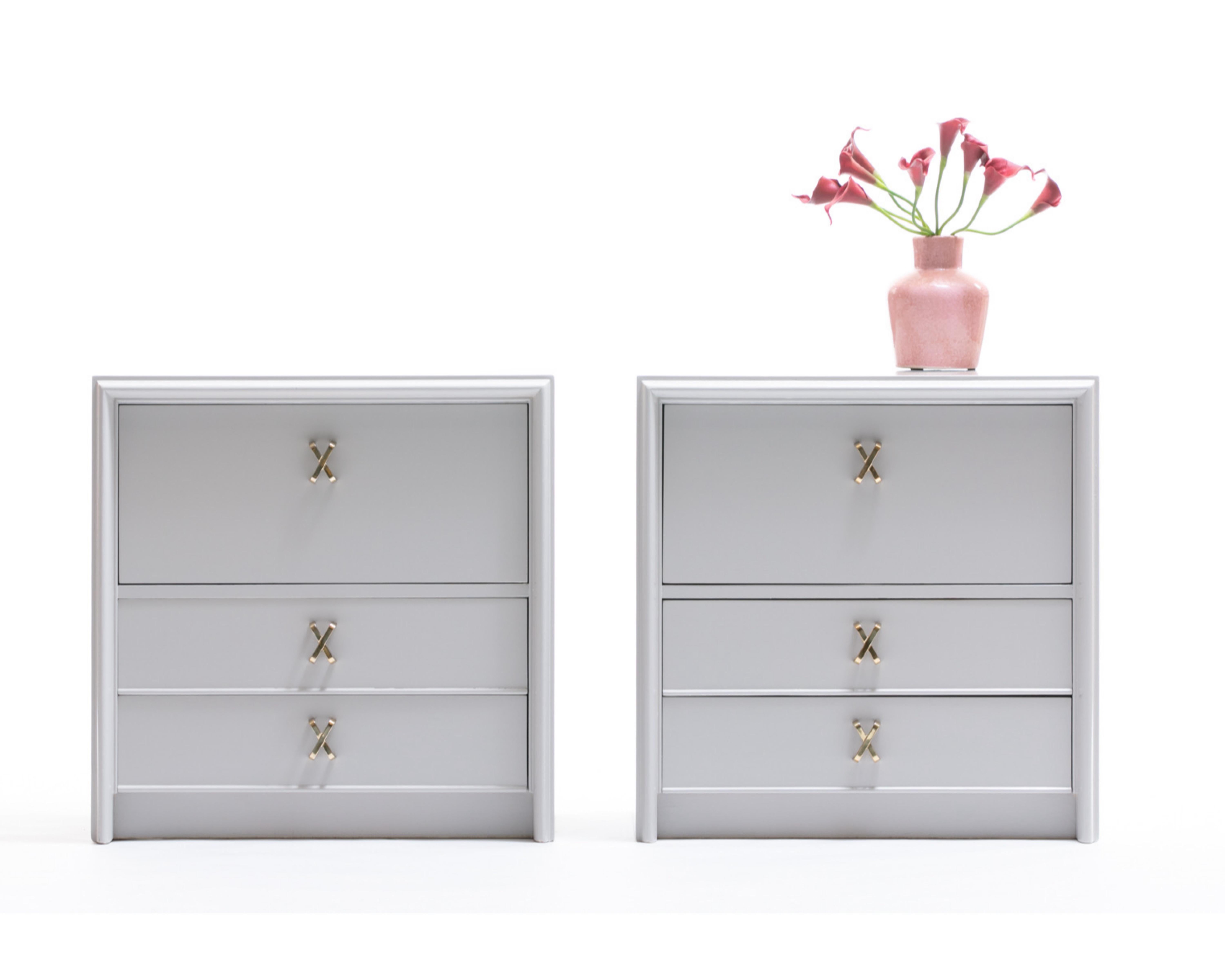 Everyone loves Paul Frankl furniture. A pillar of design, he created some of the most iconic mid century pieces of furniture. And here we have a lovely pair of Paul Frankl Farrow and Ball Pavilion Grey lacquered nightstands from Frankl's Debonair