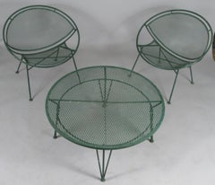 Pair of 1950s Radar Lounge Chairs and Coffee Table by Salterini