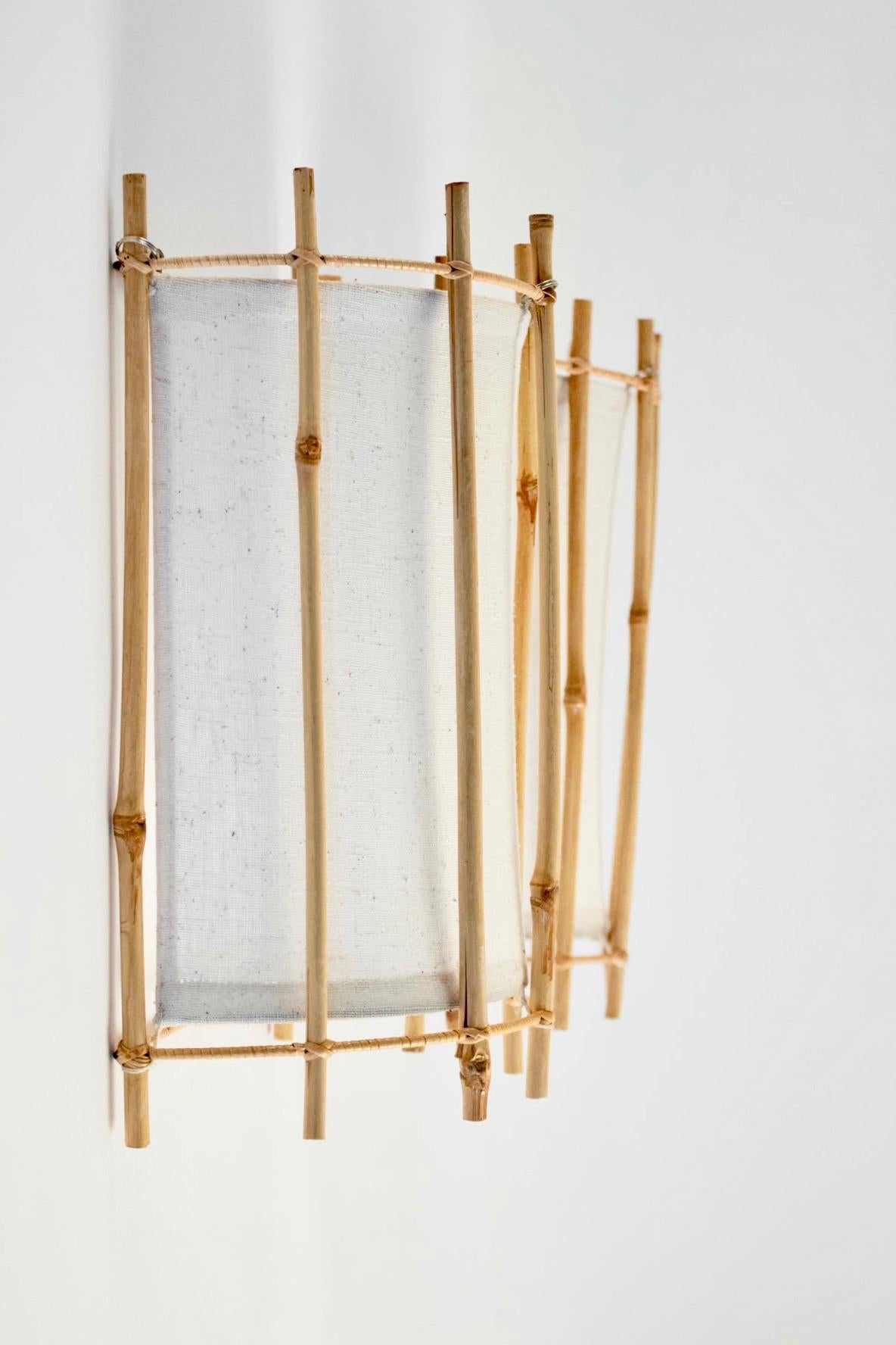 Mid-20th Century Pair of 1950s Rattan Sconces by Louis Sognot