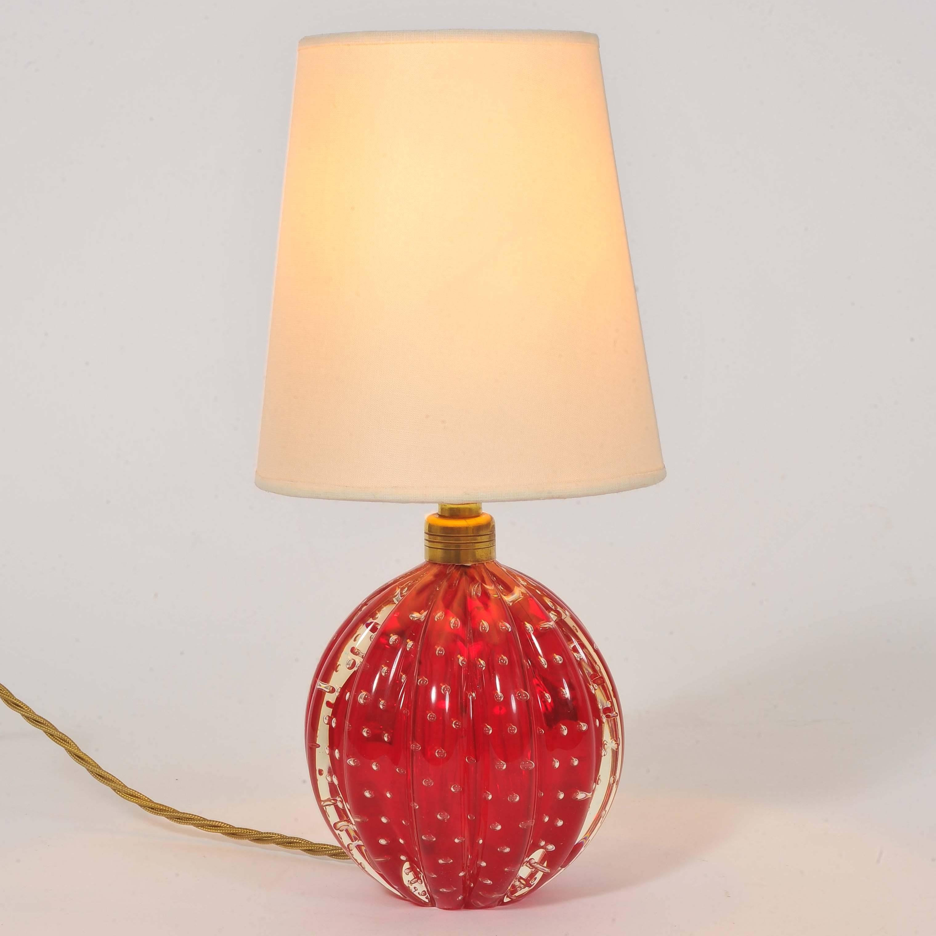 Italian glass ball lamps in red aerated glass with ribbed sides.