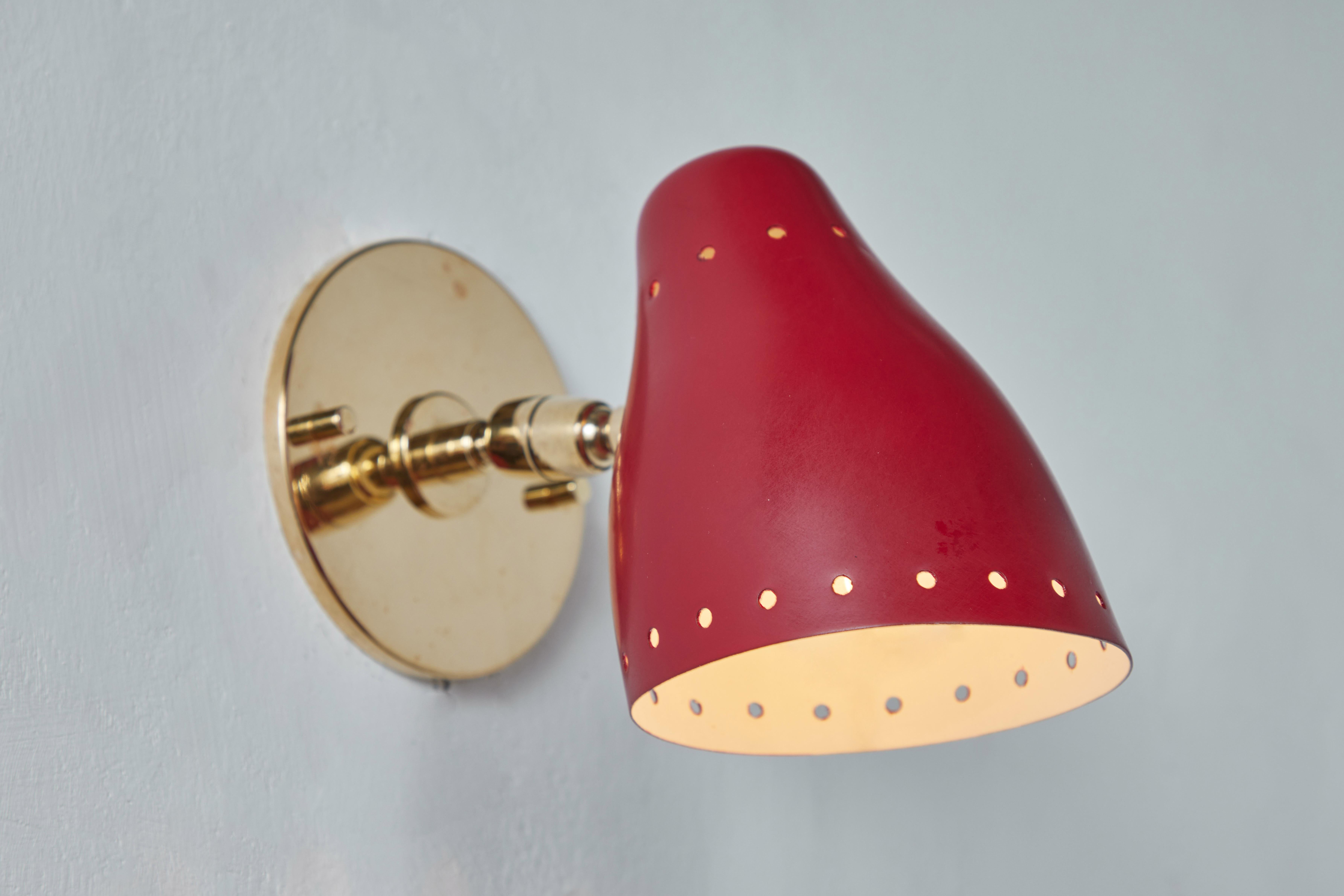 Brass Pair of 1950s Red Perforated Sconces Attributed to Jacques Biny