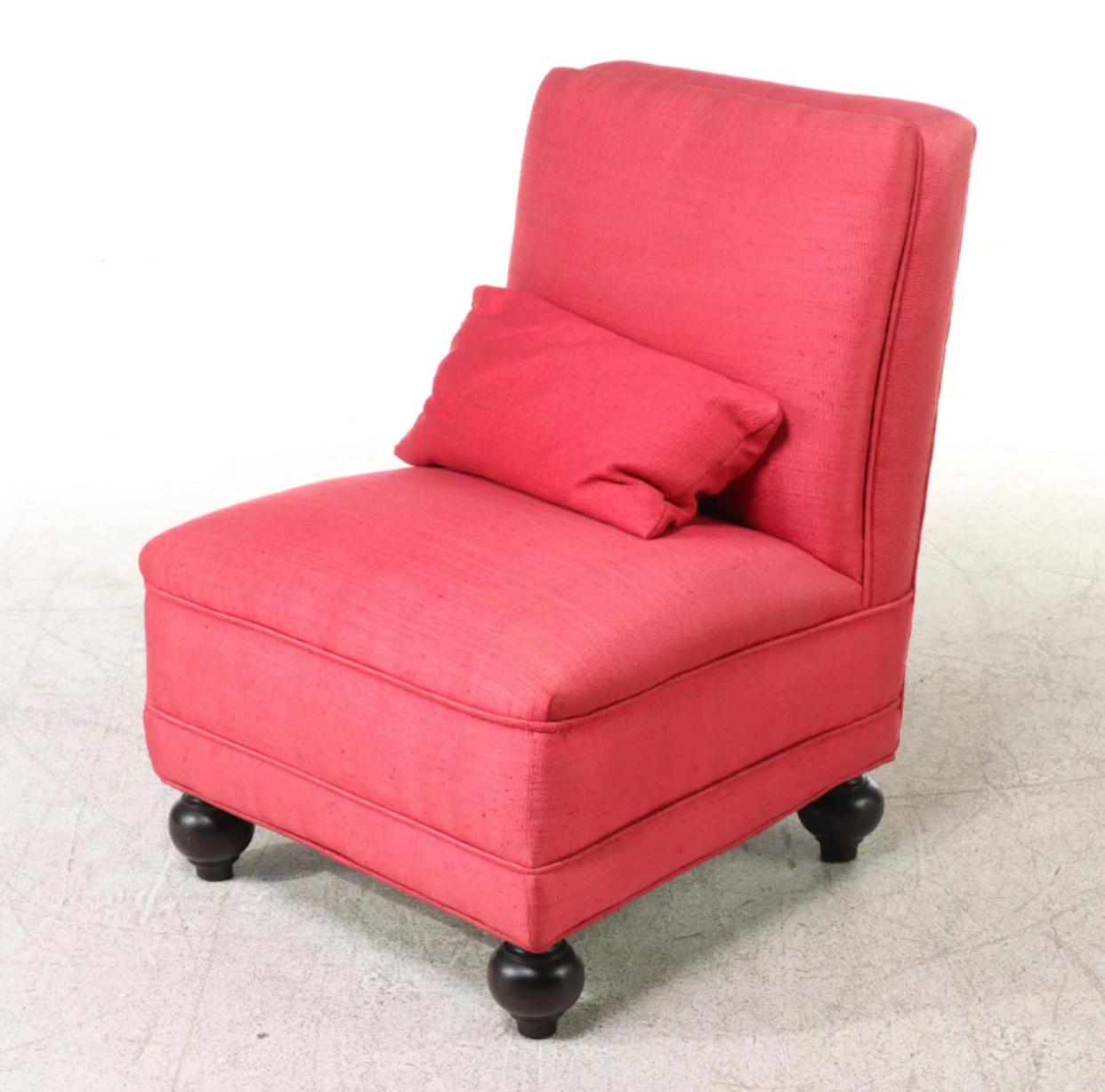 Pair of custom upholstered red silk and linen blend slipper chairs with oak ball feet, lacquered black and additional lumbar pillow. The underside has the custom upholster’s label that reads, “RENOVATED BY / THE H. & S. POGUE COMPANY / CINCINNATI,