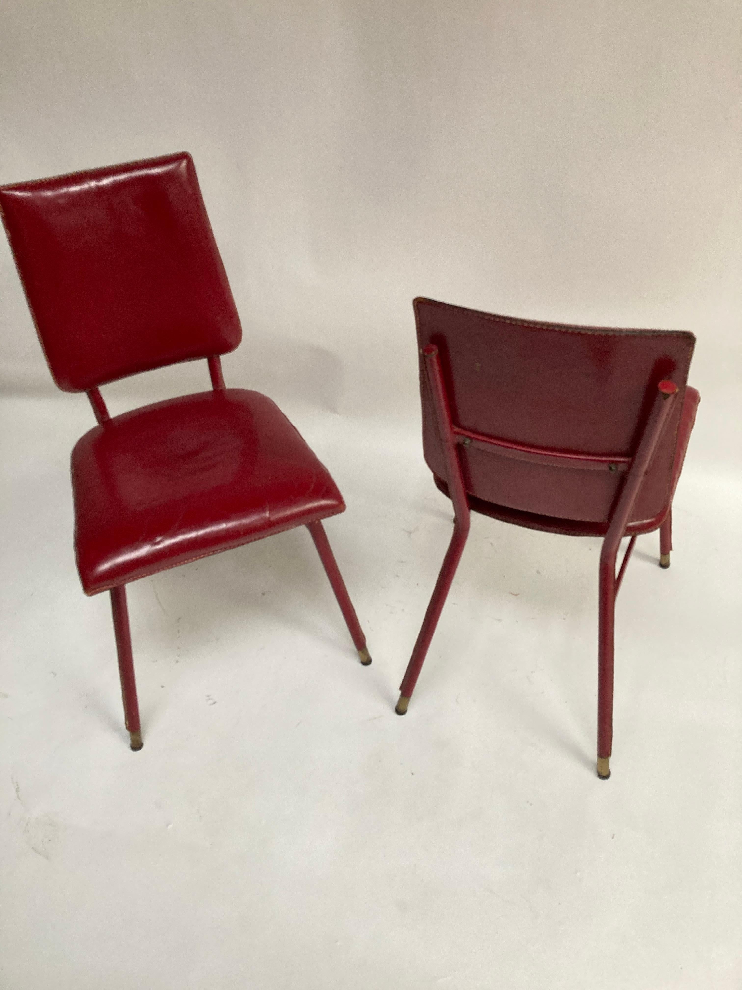 French Pair of 1950's Red Stitched Leather Chairs by Jacques Adnet For Sale