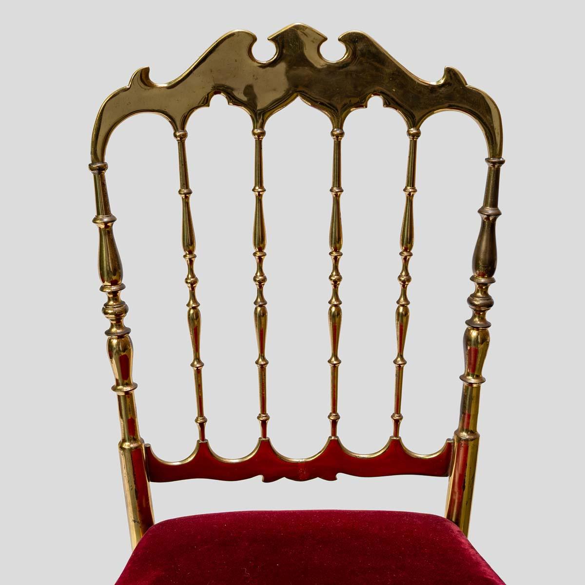 Brass Pair of 1950s red velvet upholstered brass metal chairs by Chiavari For Sale