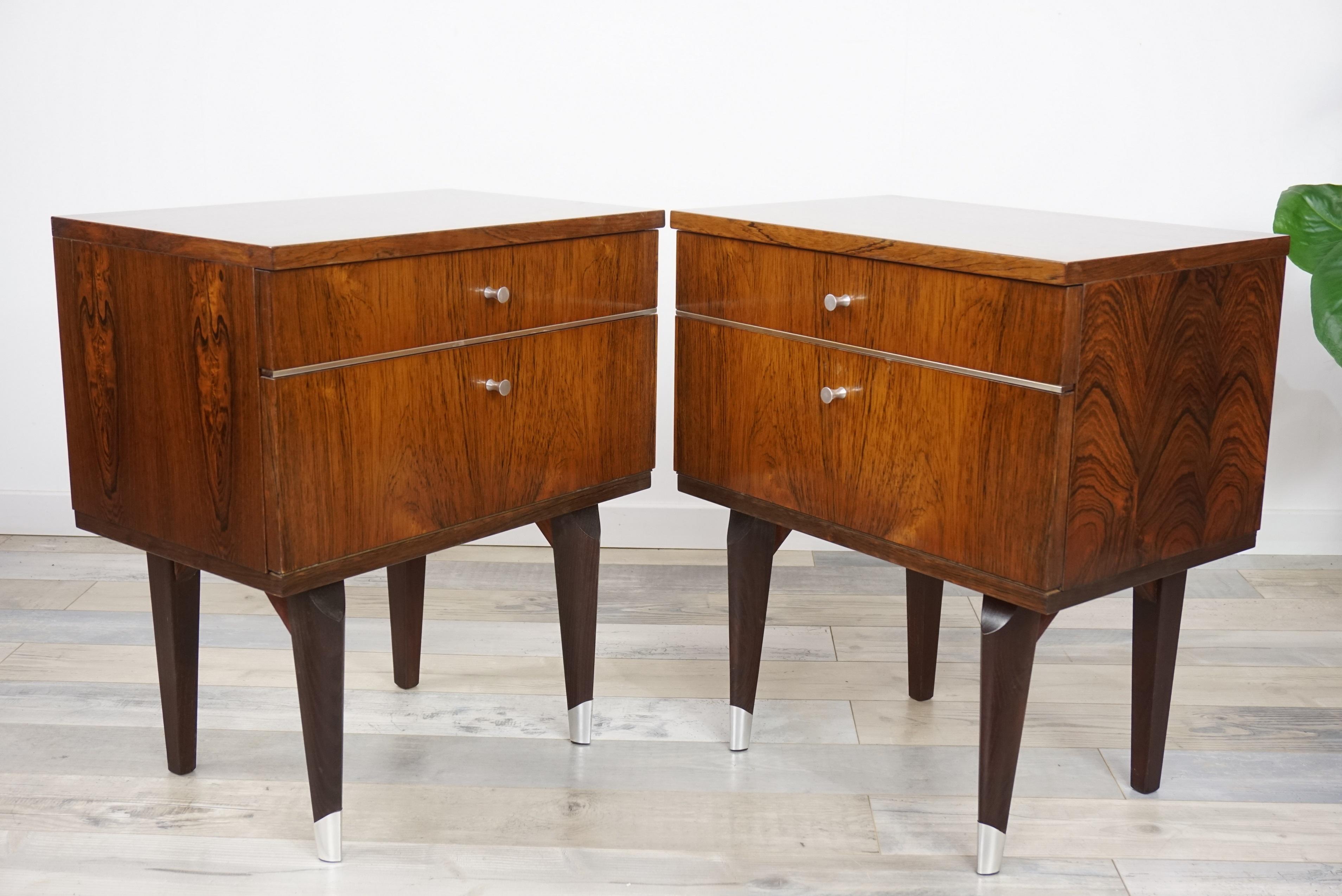 Pair of 1950s design bedside tables in rosewood, chromed handles and chromed edging, square feet chromed finished, one drawer with an opening in front by flap... All in excellent condition!