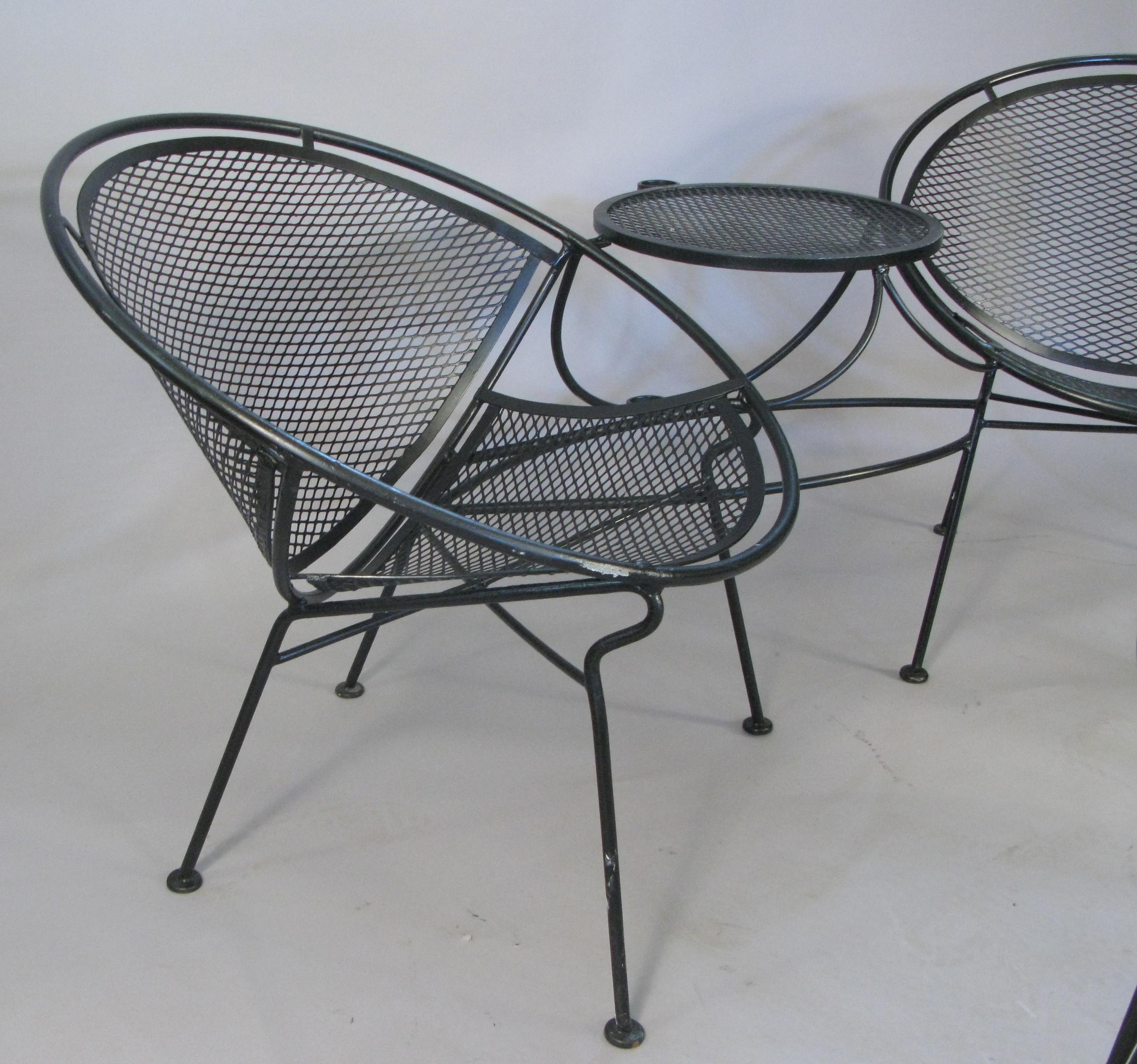 Wrought Iron Pair of 1950s Salterini Radar Tete A Tetes and Cocktail Table