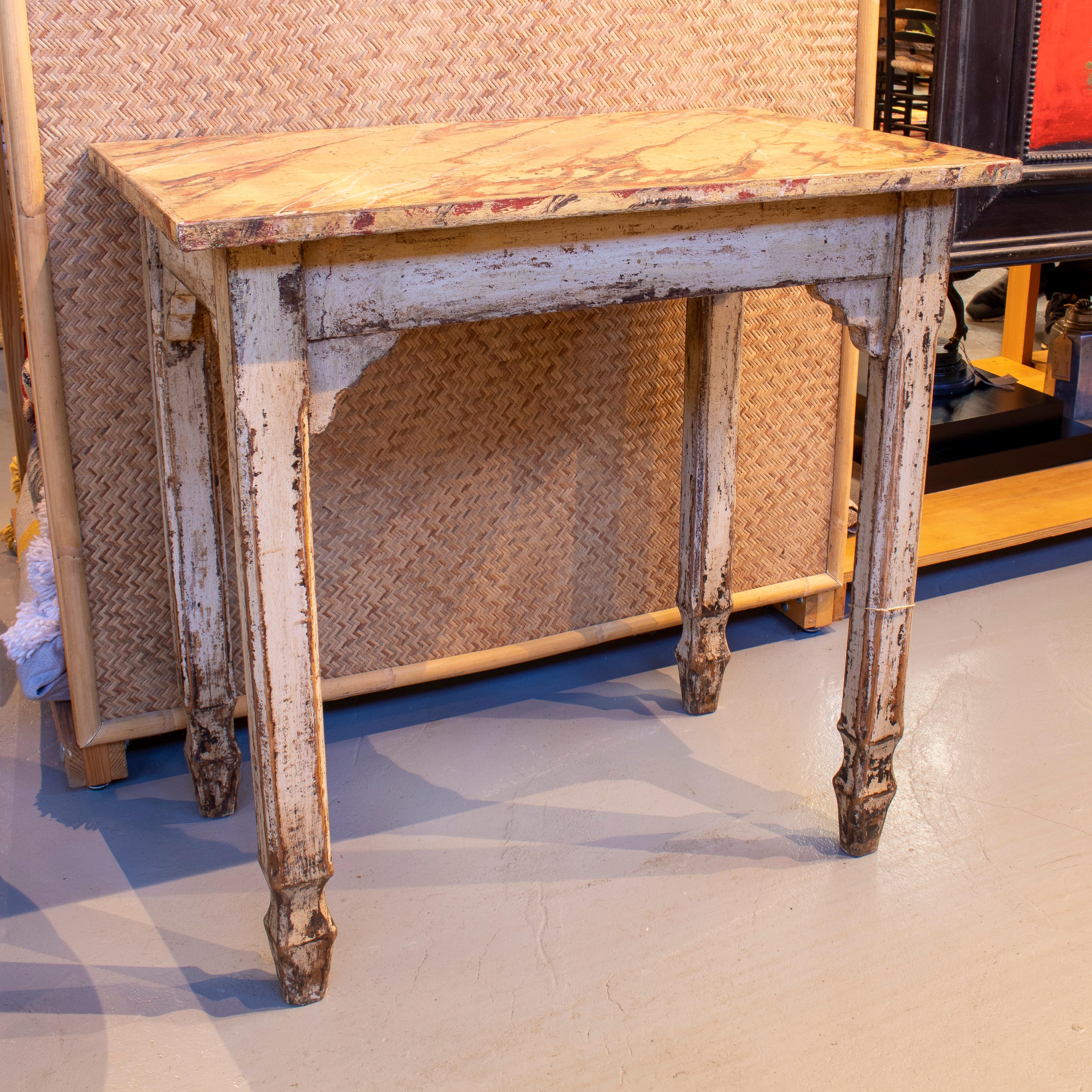 Pair of vintage 1950s Spanish faux marble wooden console tables.