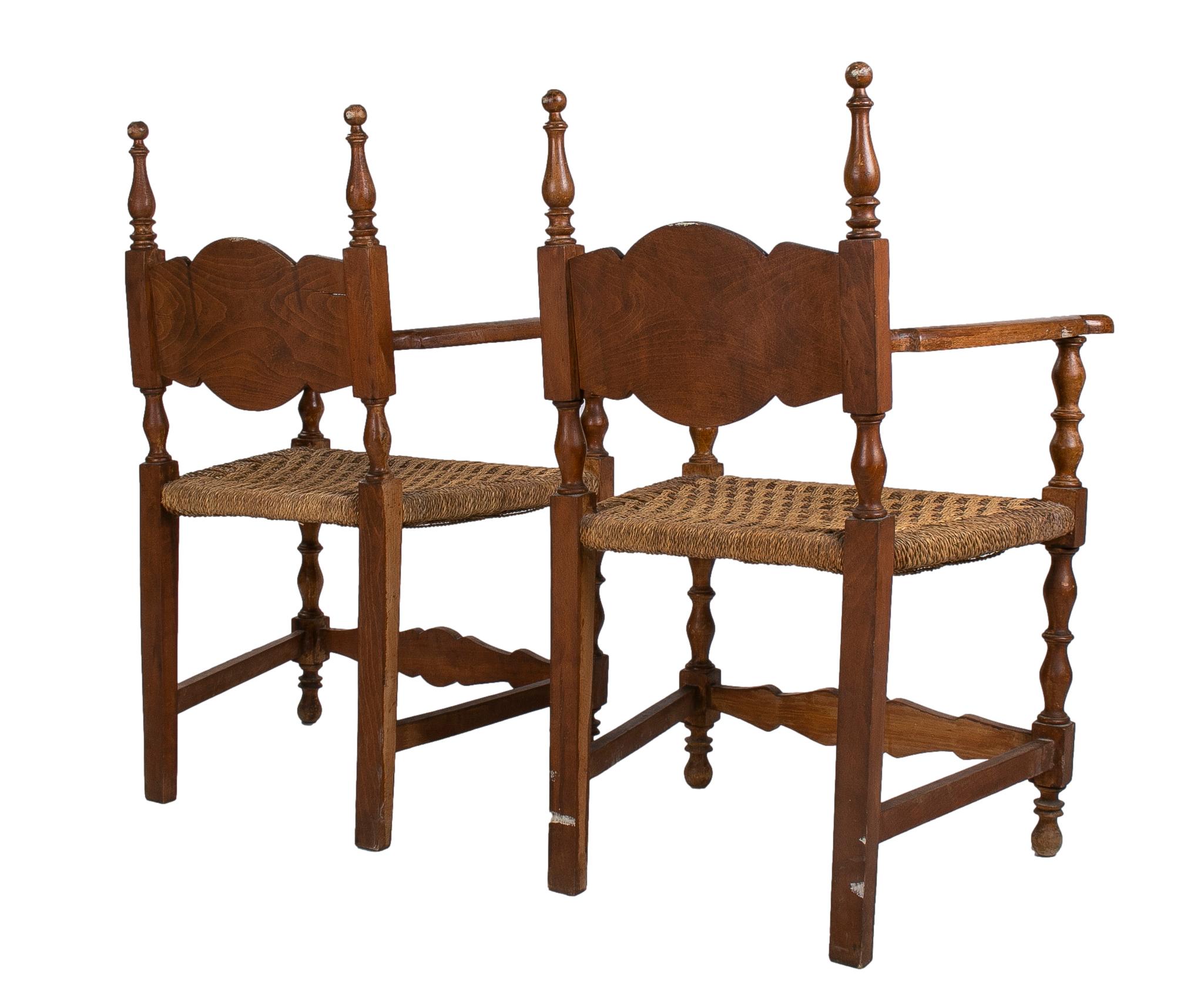 20th Century Pair of 1950s Spanish Wooden Chairs w/ Woven Dry Rope Seats For Sale