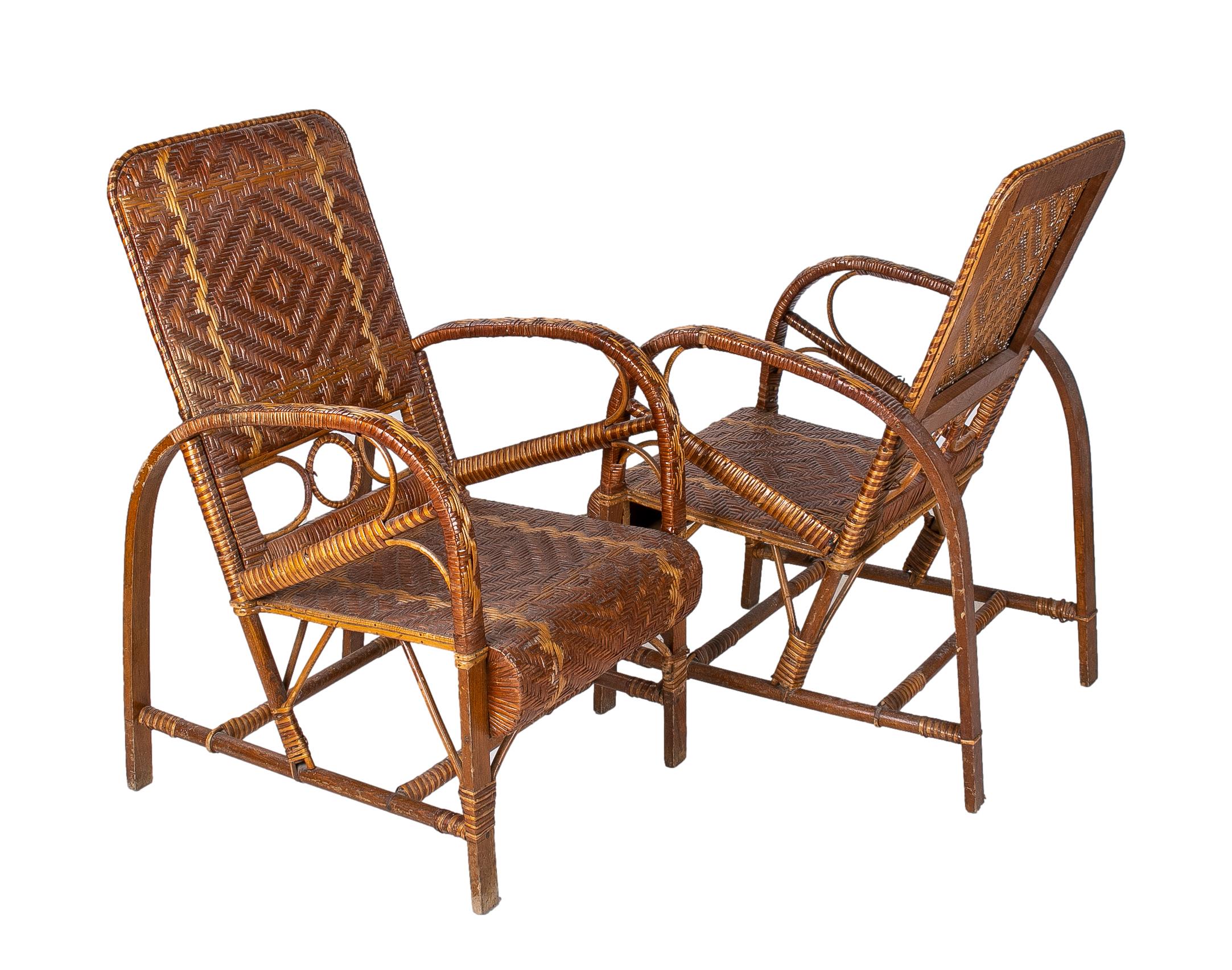 Pair of 1950s vintage Spanish hand woven lace wicker and bamboo armchairs.