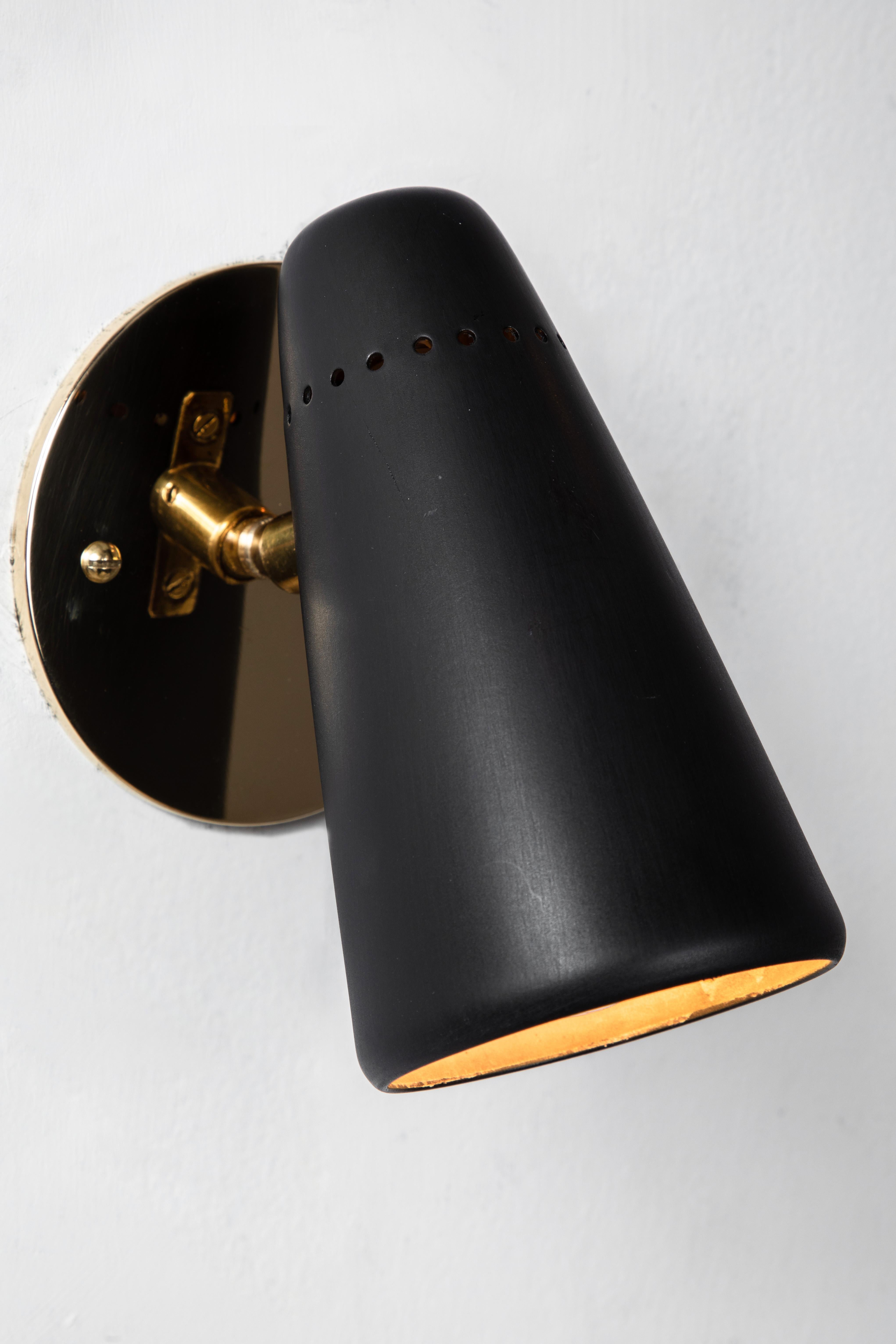 Pair of 1950s Stilnovo Sconces in Black and Brass with Yellow Label 4