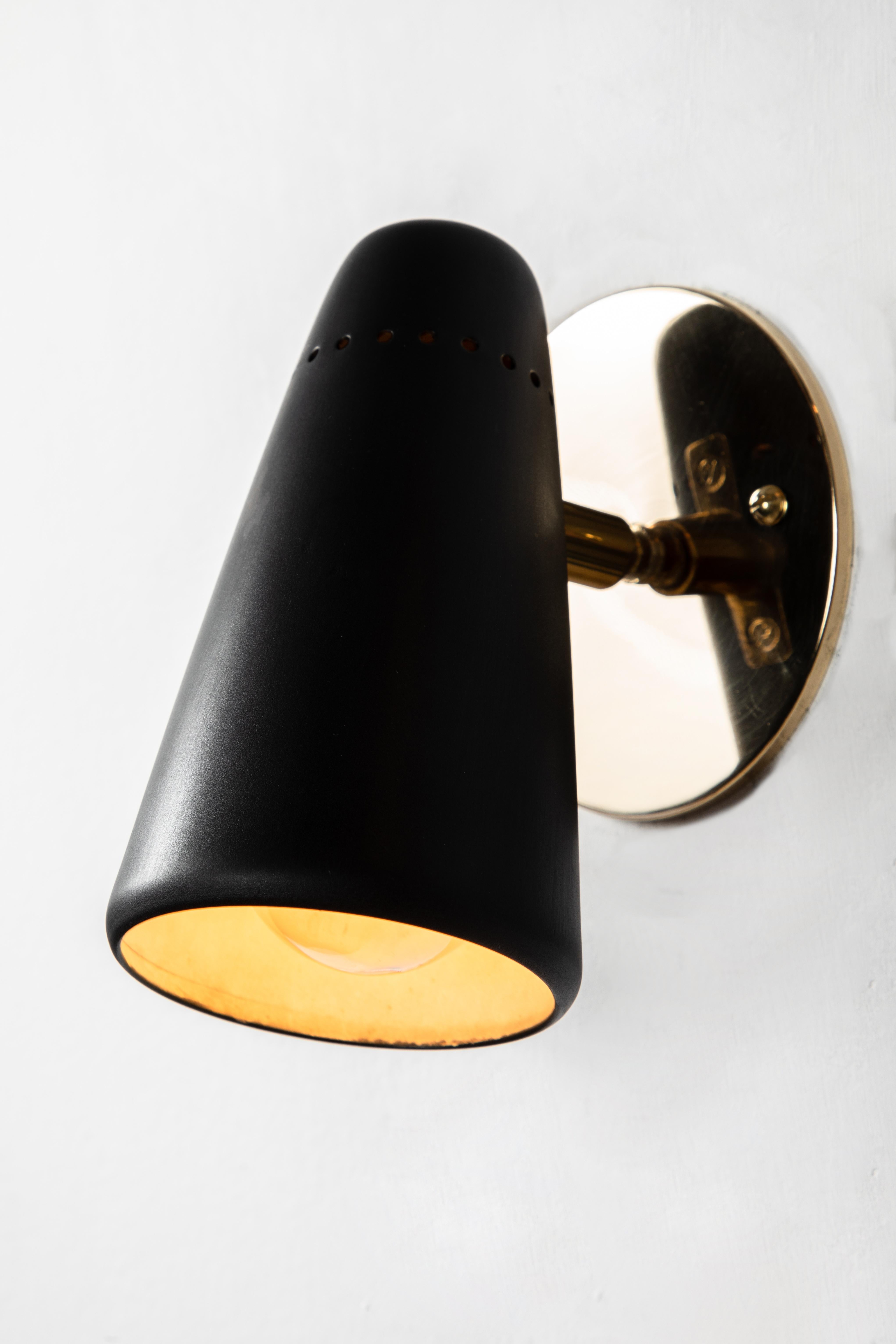 Mid-20th Century Pair of 1950s Stilnovo Sconces in Black and Brass with Yellow Label