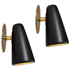 Pair of 1950s Stilnovo Sconces in Black and Brass with Yellow Label
