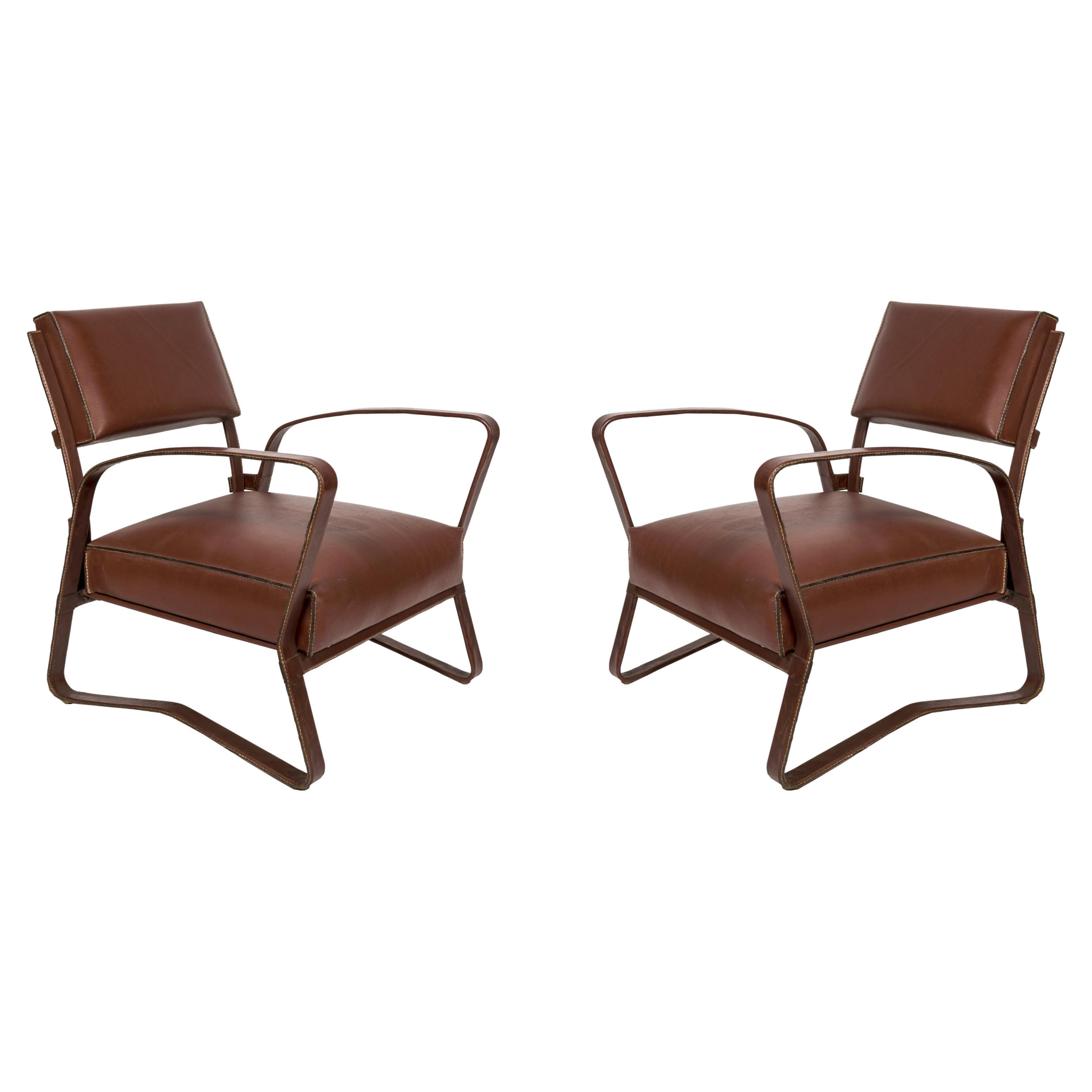 Pair of 1950's Stitched Leather Armchairs by Jacques Adnet For Sale