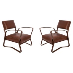 Pair of 1950's Stitched Leather Armchairs by Jacques Adnet