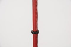 Ein Paar Stehlampen aus genähtem Leder aus den 1950er Jahren von Jacques Adnet