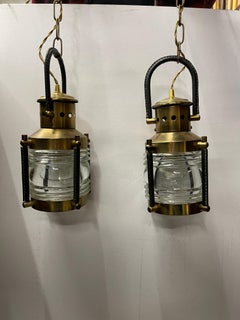 Pair of 1950's Stitched leather lanterns by Jacques Adnet