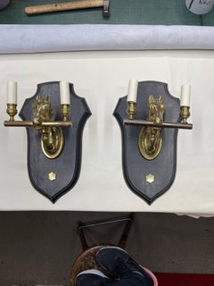 Pair of 1950's Stitched leather sconces by Jacques Adnet