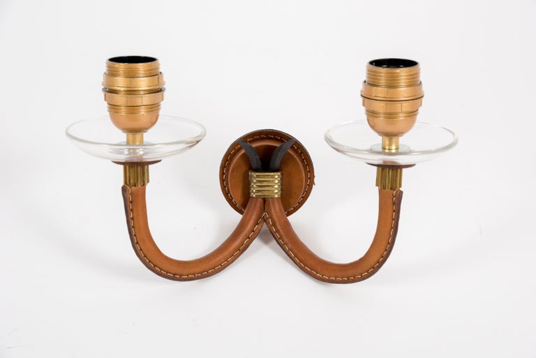 Metal Pair of 1950's Stitched Leather Sconces by Jacques Adnet For Sale